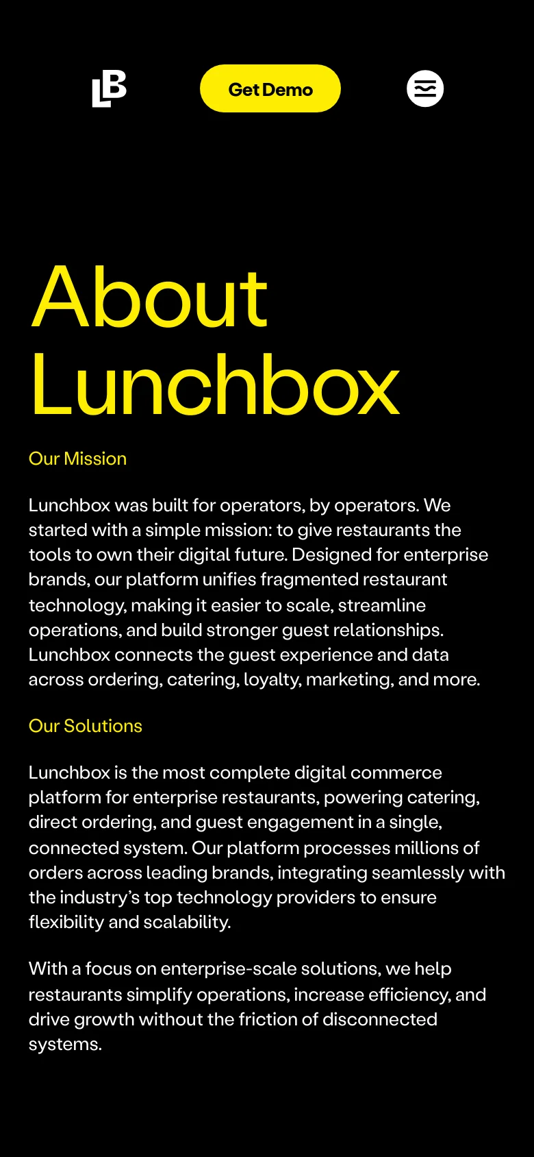 The mobile version maintains the dark aesthetic and large yellow 'About Lunchbox' headline but utilizes a simplified vertical layout. The navigation menu is condensed, and the 'Get Demo' call-to-action button is prominently centered below the logo, followed by the mission and solutions text in a single-column format.