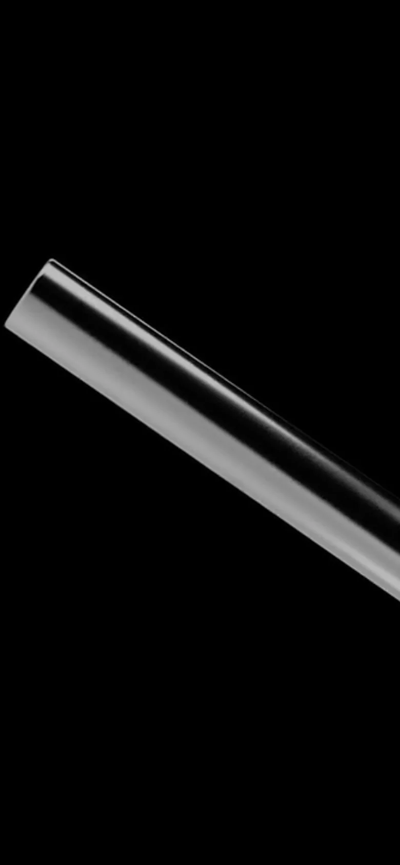 The mobile version presents a high-contrast, dark aesthetic with a black background. A single, thick diagonal silver metallic bar stretches across the dark frame, creating a minimalist and abstract visual.