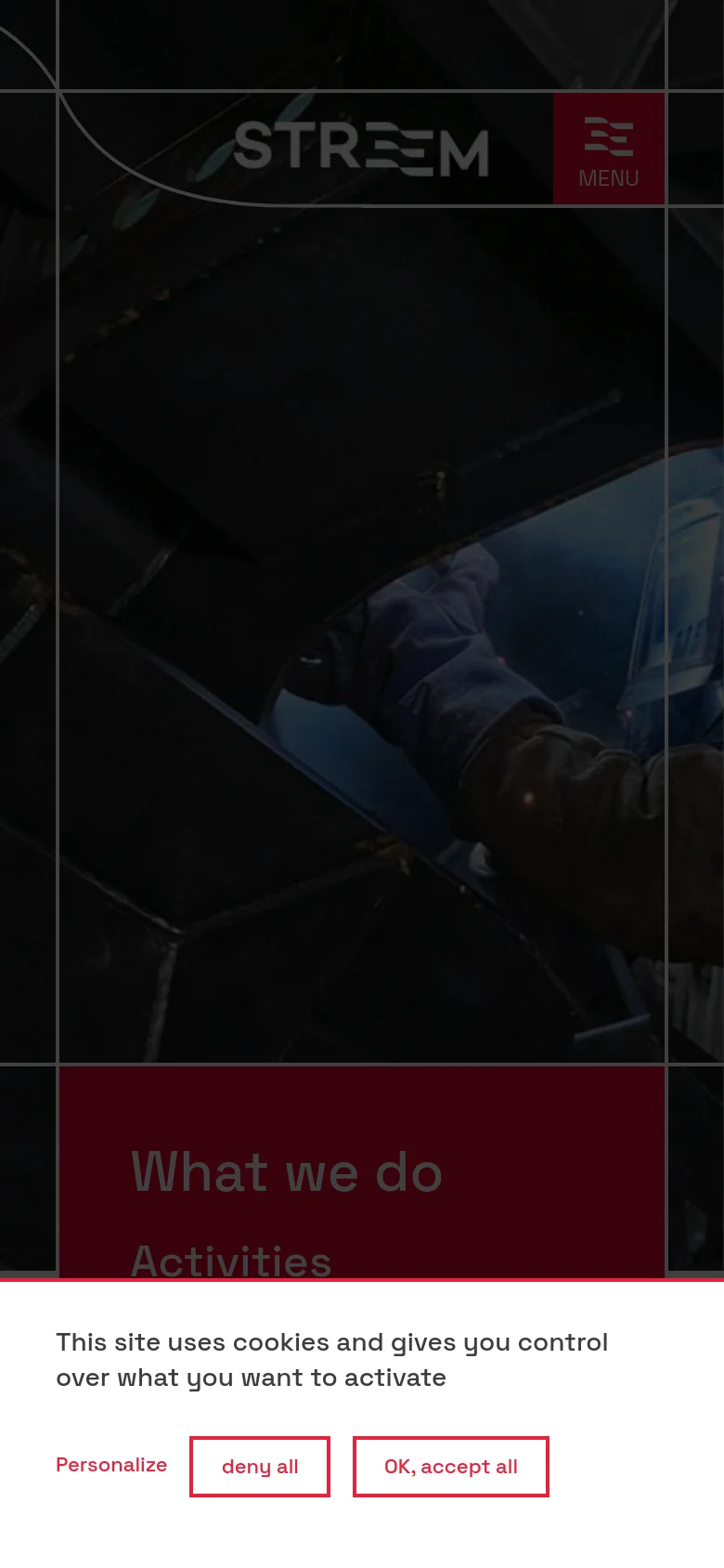 The mobile version shows a vertically cropped version of the industrial hero image with the same dark overlay. The 'What we do' headline box is positioned at the bottom, and the Streem logo and red menu icon are centered at the top of the screen.