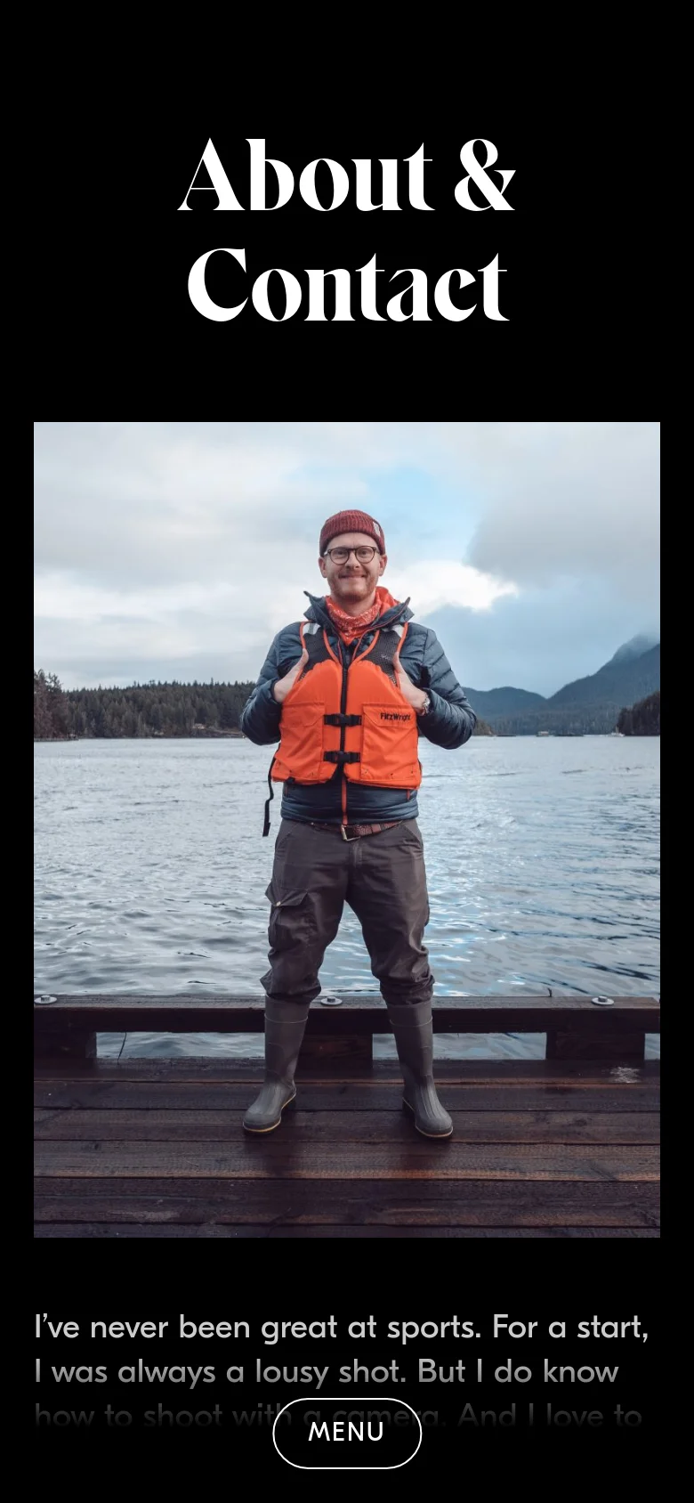The mobile version uses a vertical layout with the large 'About & Contact' headline at the top. Below the headline, a large portrait of the man in an orange life vest dominates the center, followed by the biographical text and a 'MENU' button at the bottom.