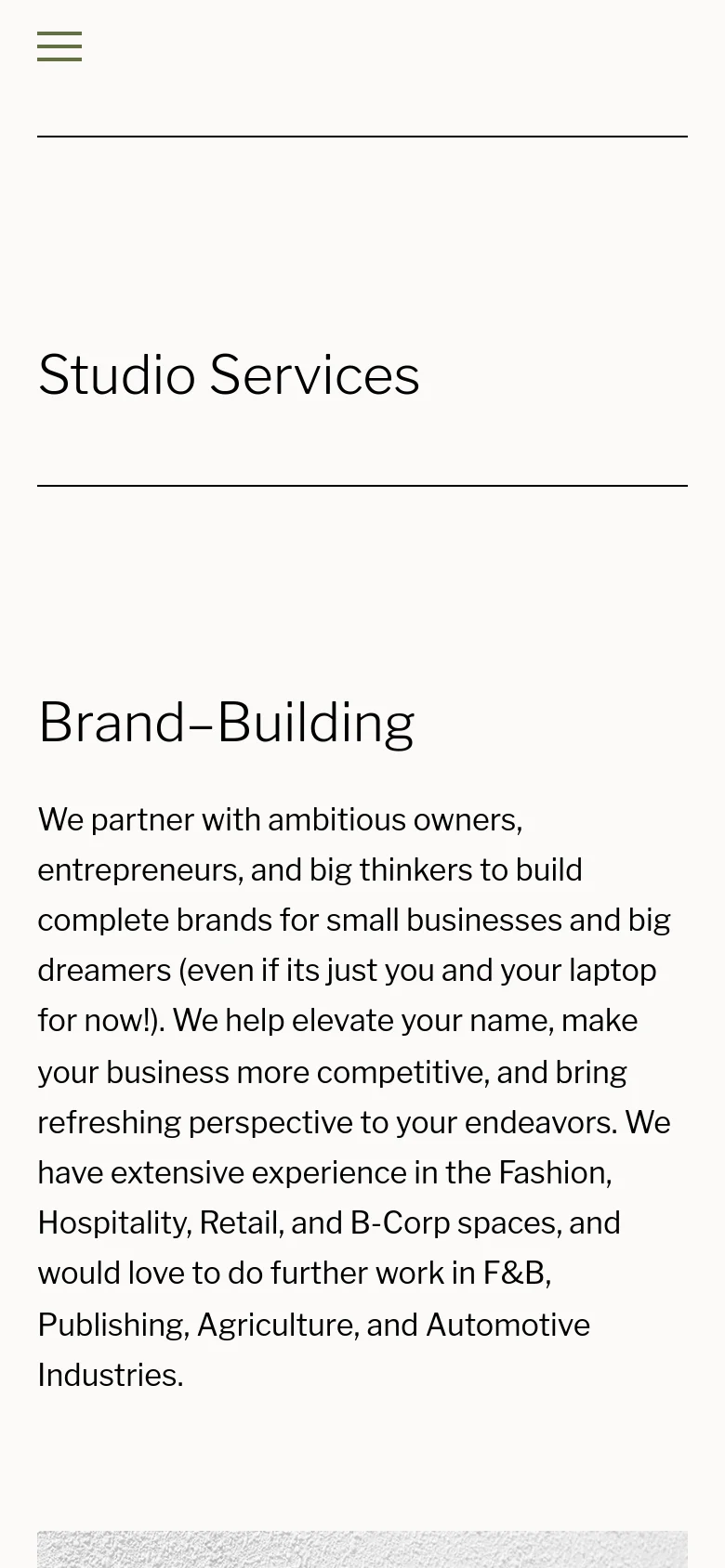 The mobile version maintains the minimalist white and black aesthetic but shifts to a single-column vertical layout. The 'Studio Services' and 'Brand-Building' headlines are stacked, and the service descriptions follow vertically, with the textured images appearing above their respective text blocks instead of side-by-side.