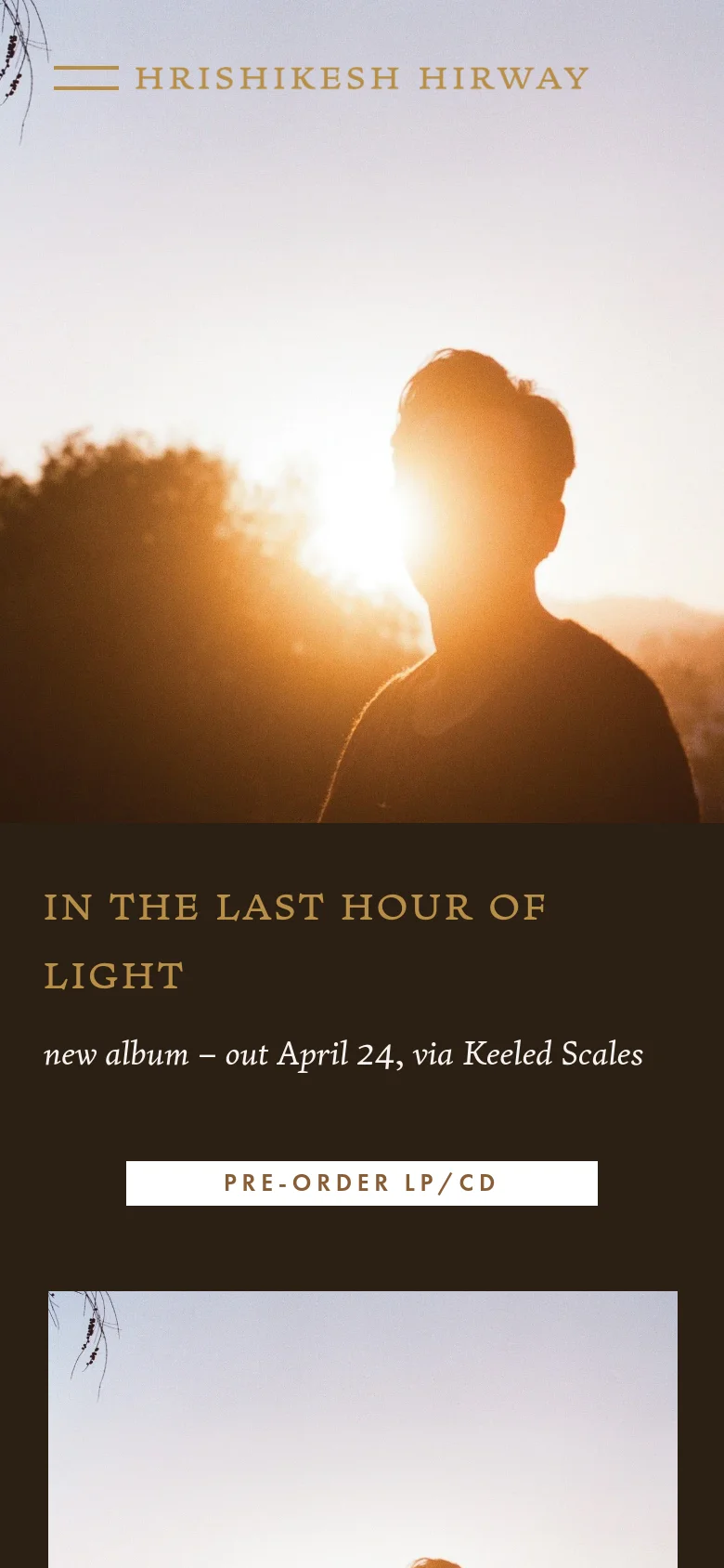 The mobile version maintains the sunset silhouette hero image and the dark promotional section for the new album. The layout is vertically stacked, with the navigation menu condensed and the album pre-order call to action centered prominently below the text.