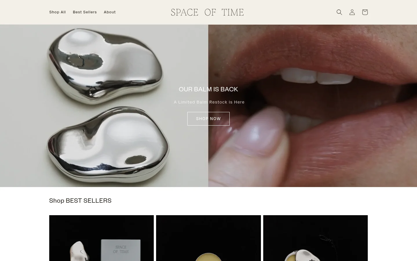 The desktop homepage features a large hero image split between a close-up of silver, organic-shaped balm tins and a person's face. A centered overlay reads 'OUR BALM IS BACK' with a 'SHOP NOW' button. Below, a 'Shop BEST SELLERS' section displays a grid of product images against dark backgrounds, including the Anywhere Calming Balm and its refill.
