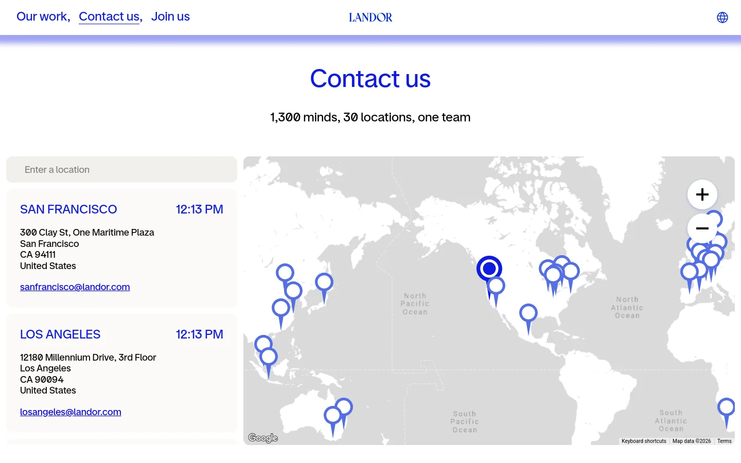 Landor contact us page featuring a minimalist layout with a large world map and location cards. The design uses a clean white and light gray palette with bold blue typography, displaying office addresses and local times for global studios.