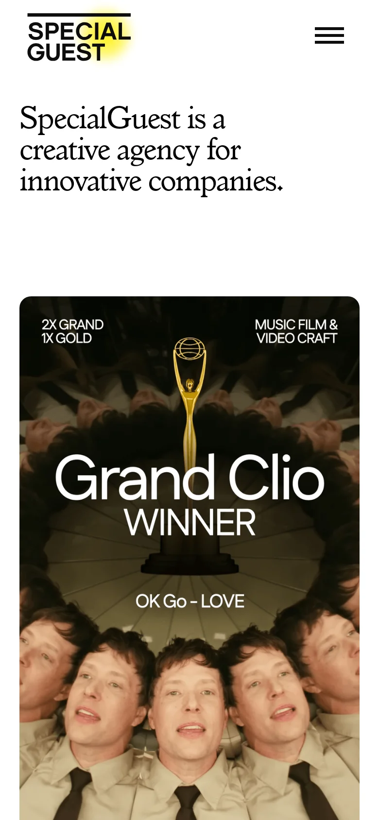 The mobile version uses a vertical layout with the 'SpecialGuest' logo and a hamburger menu icon at the top. The headline 'SpecialGuest is a creative agency for innovative companies' is prominently displayed above a large, vertically oriented hero image celebrating a 'Grand Clio Winner'. The color palette remains clean with high-contrast black text on a white background.