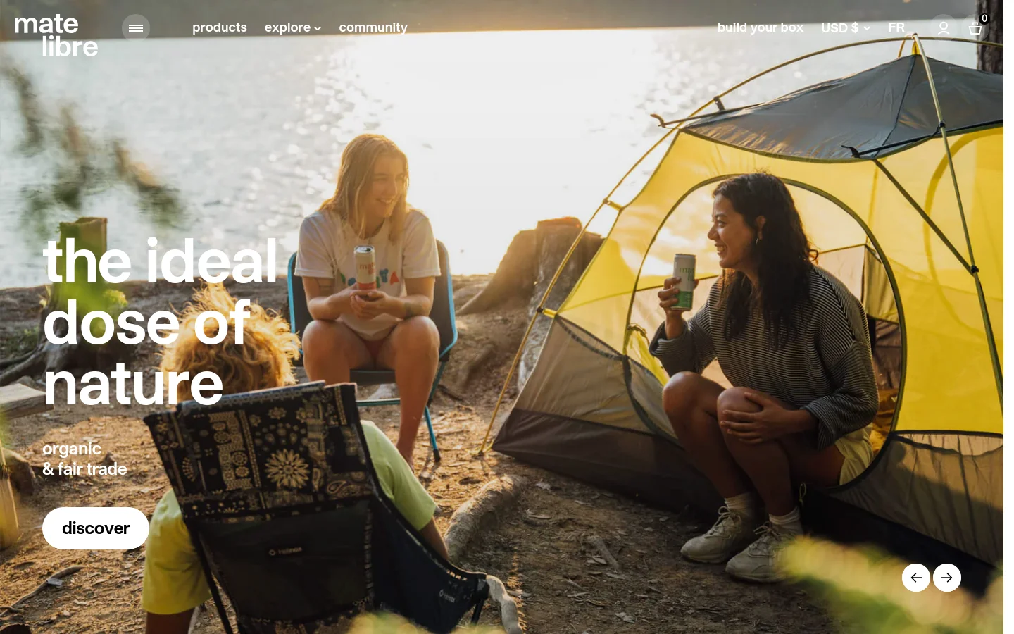 The desktop homepage features a clean white navigation bar with links to products, explore, and community. The hero section displays a large lifestyle photograph of people camping by a lake, overlaid with the headline 'the ideal dose of nature' and a 'discover' button. Below the hero, the layout transitions into a series of full-width image banners and product showcase sections with a minimalist aesthetic.