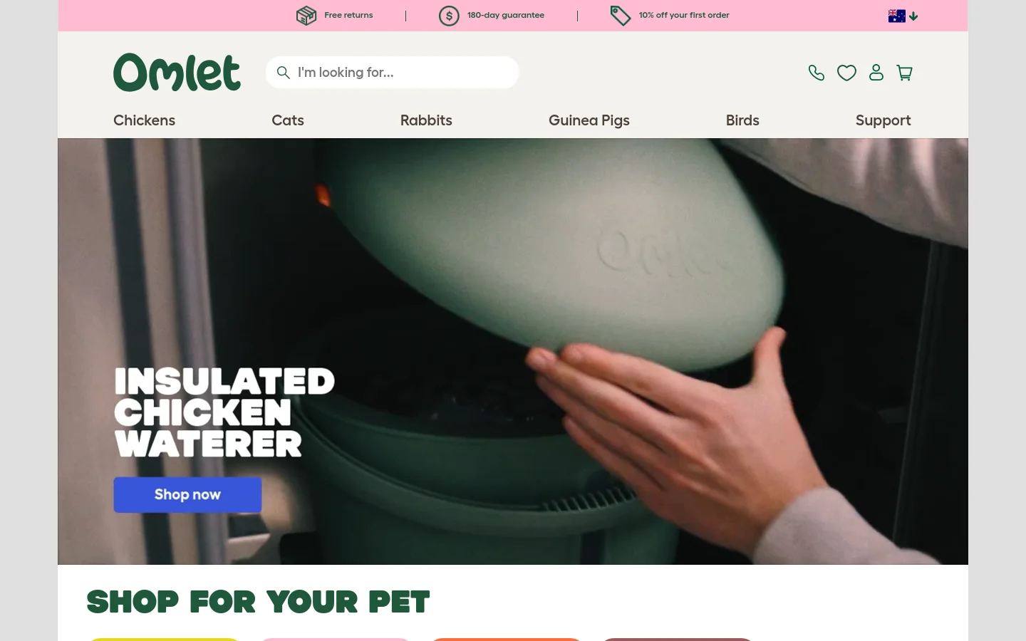 The Omlet homepage features a clean white and green design with a large hero video/image showcasing an insulated chicken waterer and a 'Shop now' button. Below the hero, a 'Shop for your pet' section uses playful animal illustrations for categories like Chickens, Cats, Rabbits, and Guinea Pigs. A product grid follows, highlighting items like the Eglu Cube coop and smart autodoor with prices and 'Shop now' links.