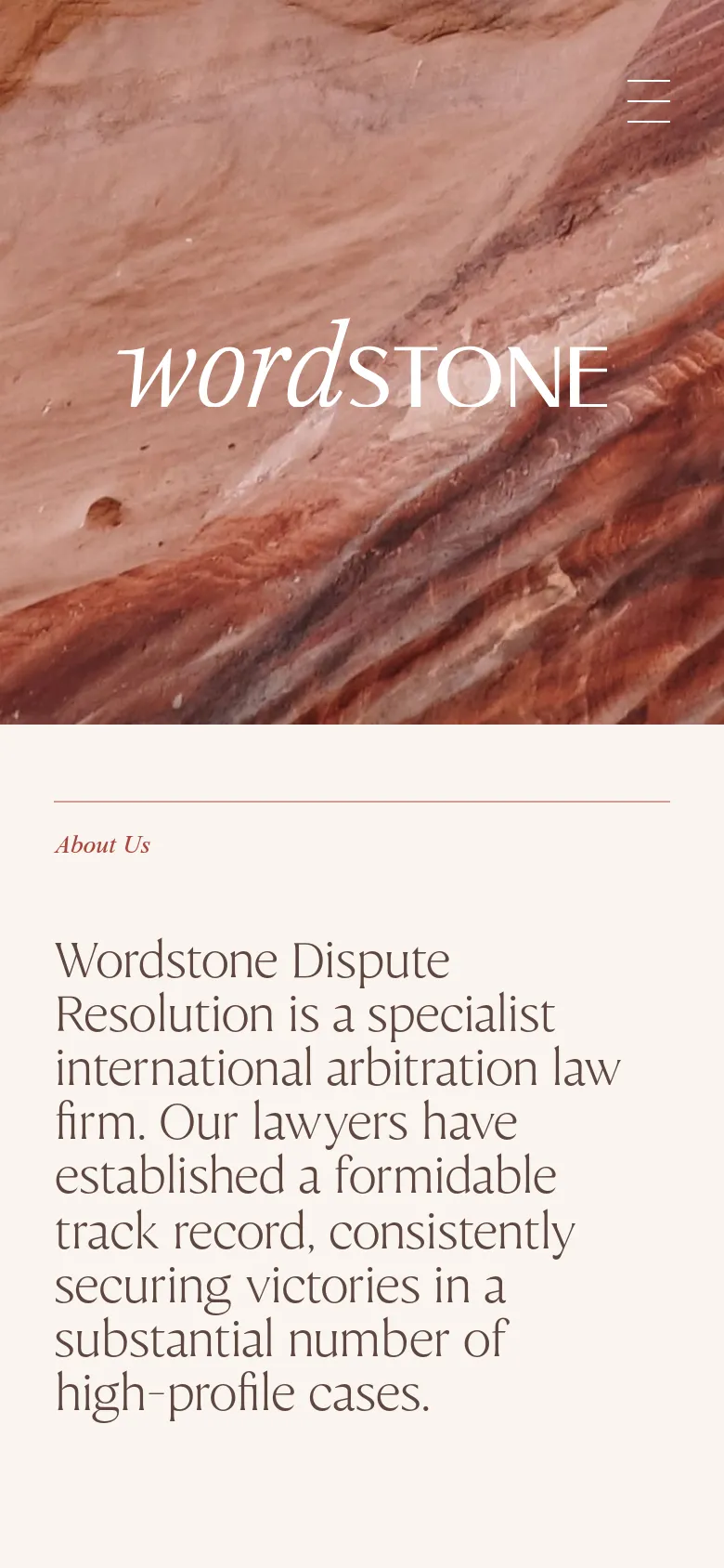 The mobile version presents a simplified vertical layout starting with the 'wordstone' logo overlaid on a close-up of reddish rock textures. A hamburger menu icon is visible at the top right, and the 'About Us' section follows immediately below the hero image with large, readable typography on a light cream background.