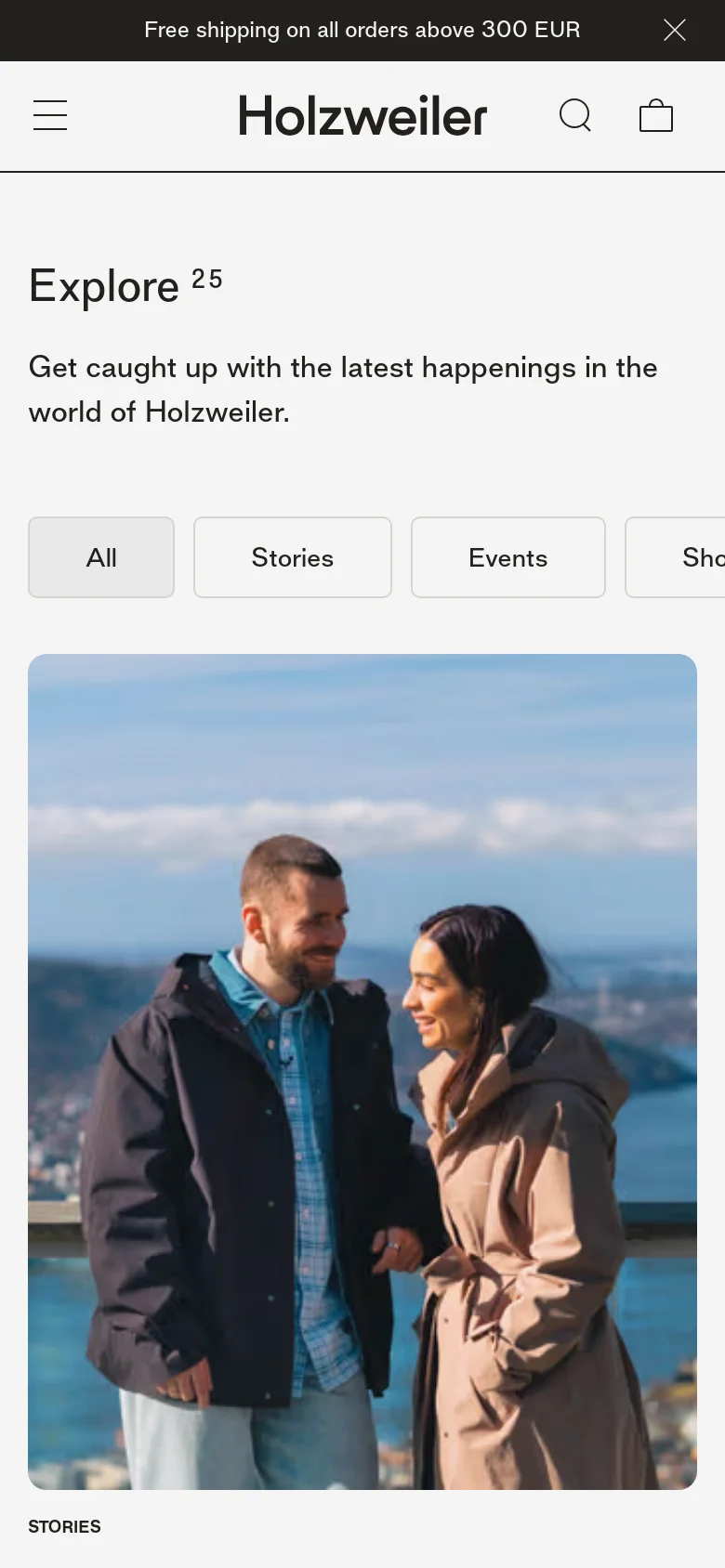 The mobile version simplifies the layout, stacking the 'Explore 25' headline and description above a single large hero image. The filter buttons are presented in a horizontally scrollable row, and the top navigation is condensed into a hamburger menu, search icon, and shopping bag icon.