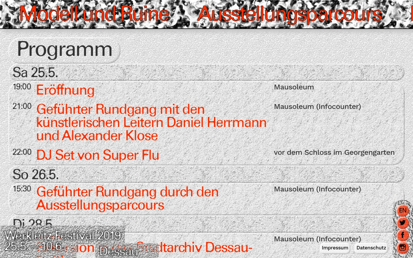 The desktop page features a light gray, textured stone-like background with large orange and black typography. The layout presents a chronological festival program under headings like 'Sa 25.5.' and 'So 26.5.', listing event times, titles in orange, and locations in black. A large header reads 'Modell und Ruine Ausstellungsparcours' in orange at the top.