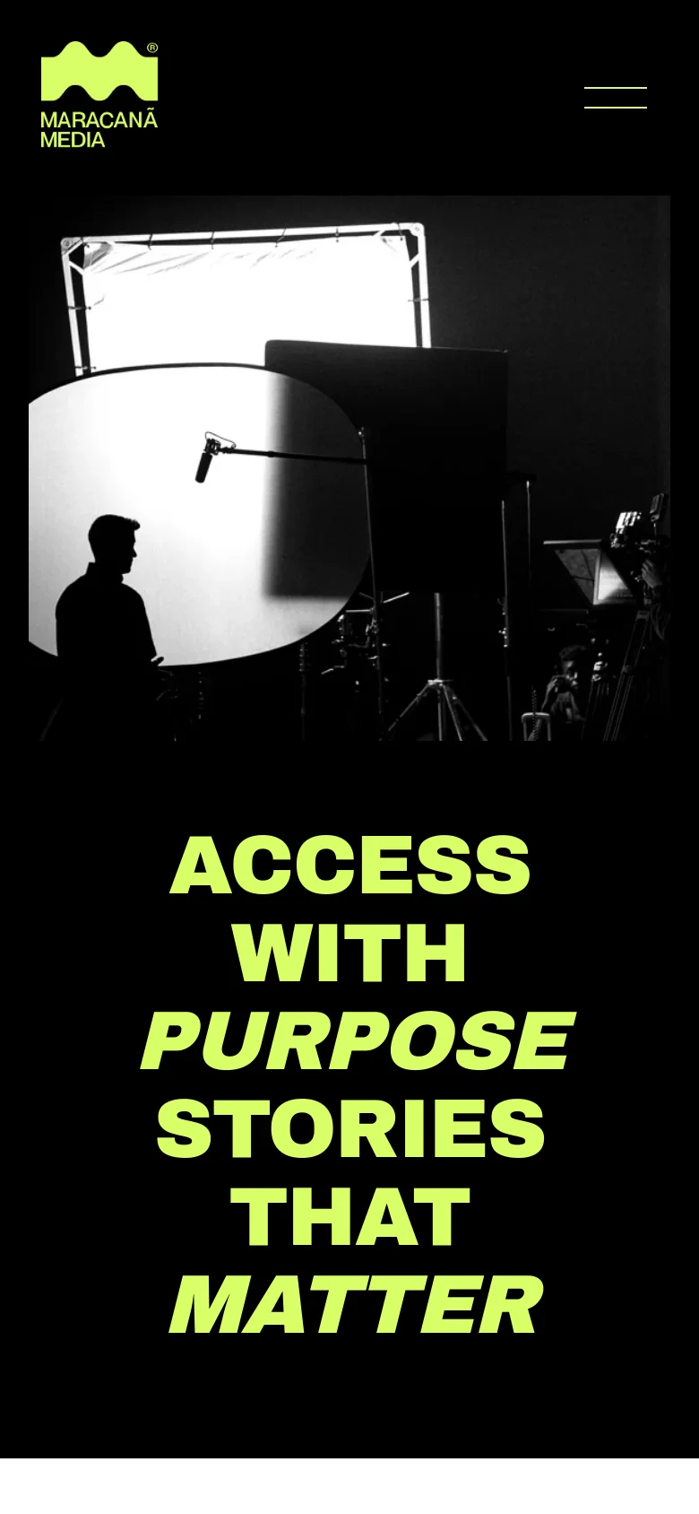 The mobile version maintains the black background and lime green branding but uses a simplified layout. The navigation menu is condensed into a hamburger icon in the top right, and the hero text is stacked vertically in large, bold lime green letters over the black-and-white film set imagery.