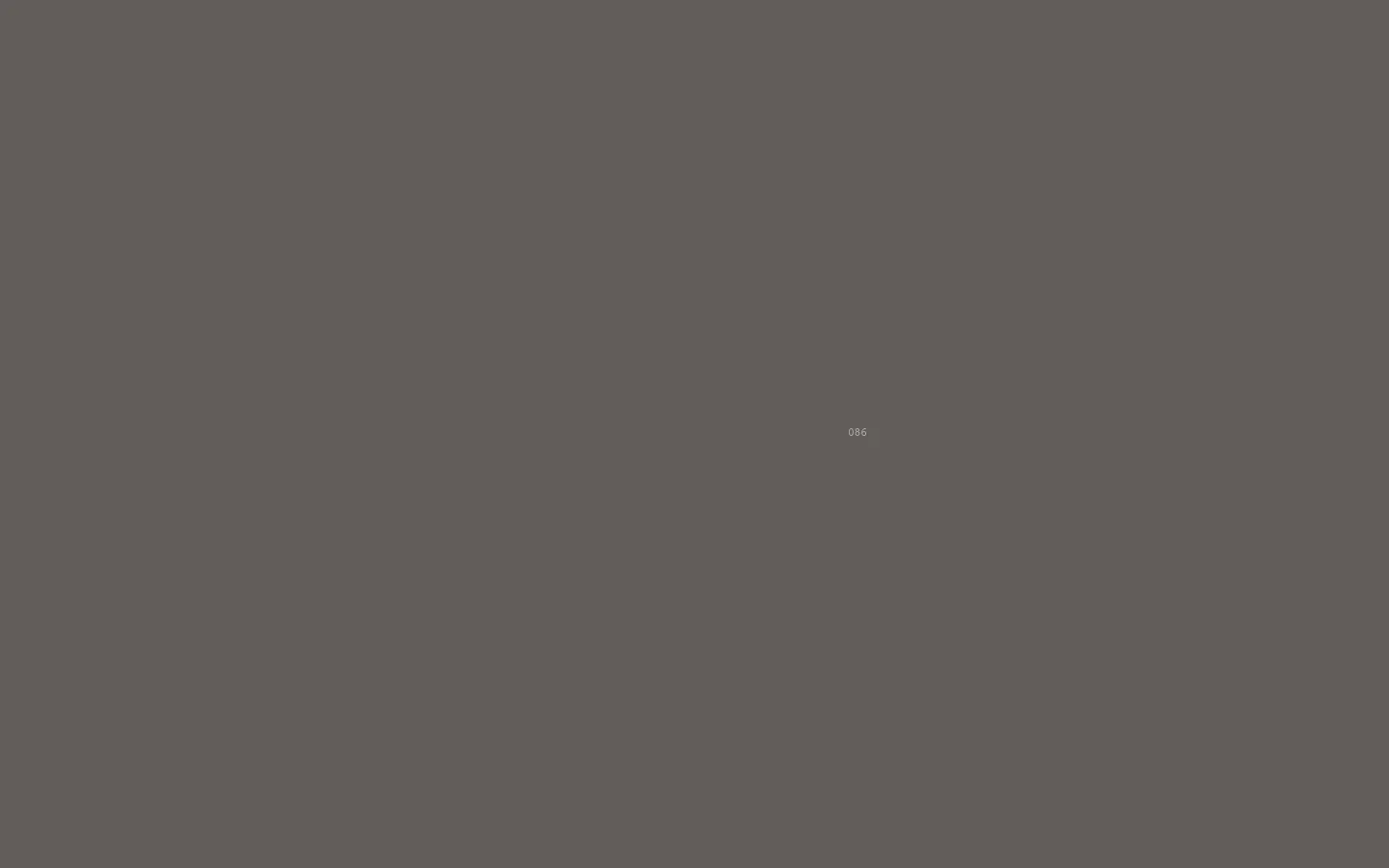 The About page features a minimalist, dark gray background with white typography. The layout includes a large hero section with vertical text describing RAD as a social enterprise architecture firm, followed by structured sections titled 'Why We Exist' and 'What We Believe.' Navigation links and contact information are placed at the bottom in a clean, text-based footer.