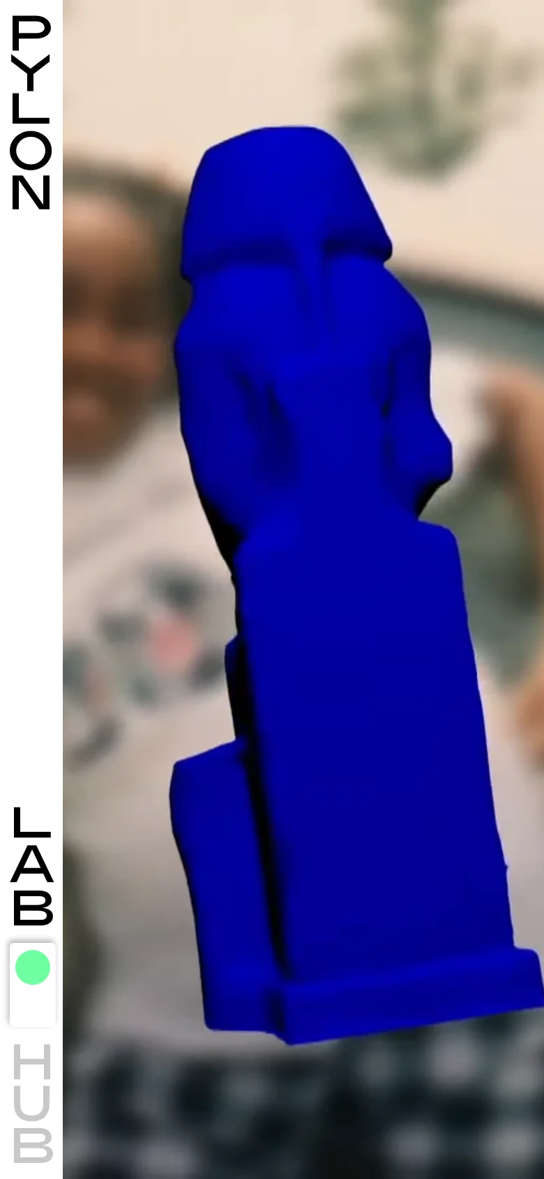 The mobile version maintains the blurred background and central blue 3D sculpture but uses a vertical orientation. The text elements are rearranged, with 'PYLON' at the top left and 'LAB' and 'HUB' stacked vertically on the bottom left, creating a more compressed, portrait-focused view.