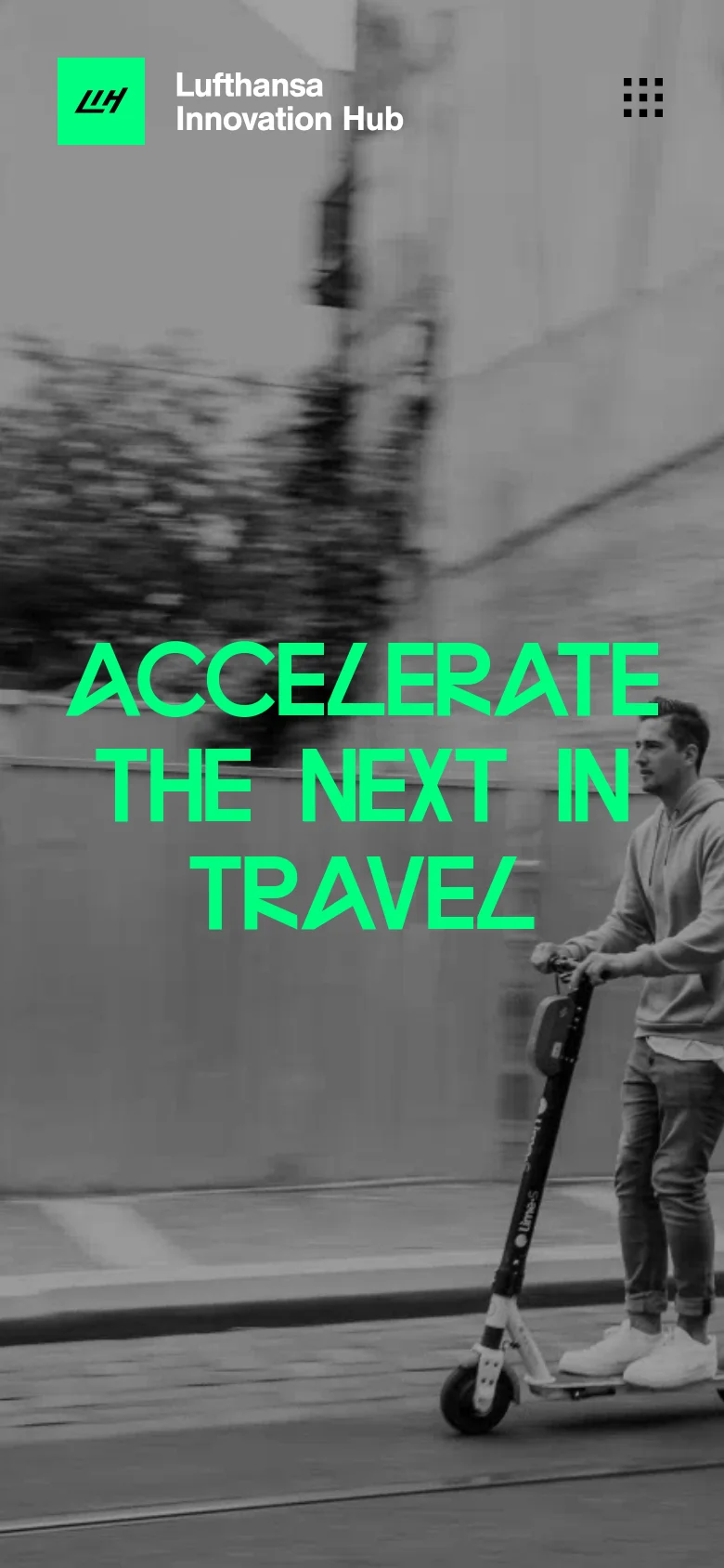 The mobile version shows a vertical, full-screen hero image of a person riding an electric scooter on a city street, overlaid with the teal headline 'ACCELERATE THE NEXT IN TRAVEL'. The Lufthansa Innovation Hub logo is positioned at the top left, and a grid-style menu icon is at the top right. The layout is simplified for a single-column vertical scroll.
