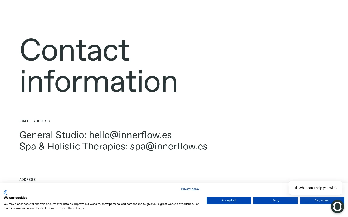 The desktop contact page features a minimalist white layout with large, dark grey typography. The content is organized vertically with sections for email addresses, physical address, and club schedules, separated by thin horizontal lines. A cookie consent banner appears at the bottom with blue action buttons and a chat widget in the corner.