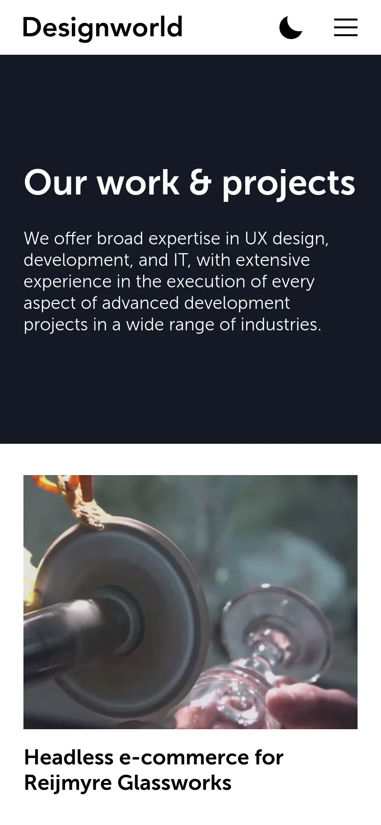 The mobile version presents a simplified layout with a white header containing the Designworld logo, a dark mode toggle, and a hamburger menu icon. The hero section remains dark navy with large white text, and the project grid transitions into a single-column vertical stack of large images and titles.
