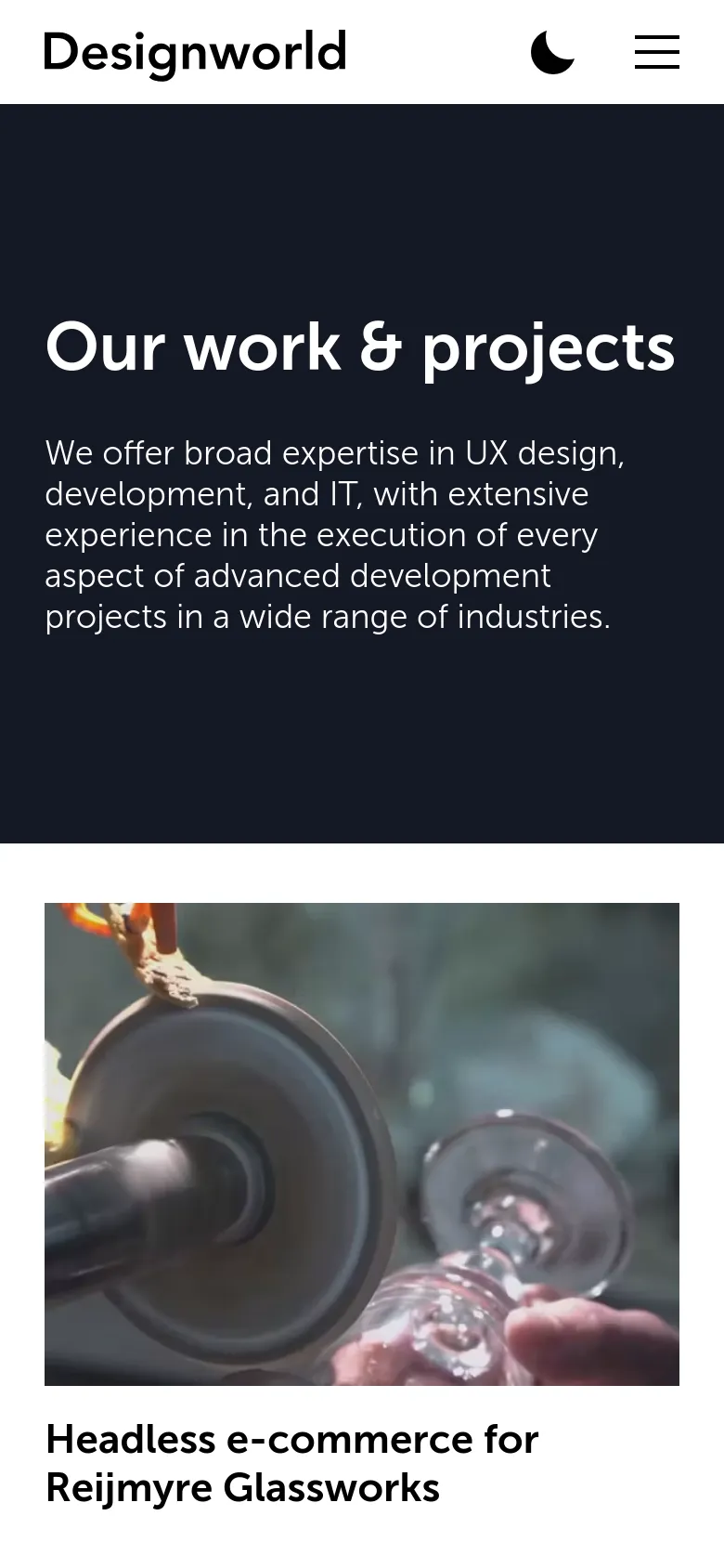 The mobile version presents a simplified layout with a white header containing the Designworld logo, a dark mode toggle, and a hamburger menu icon. The hero section remains dark navy with large white text, and the project grid transitions into a single-column vertical stack of large images and titles.