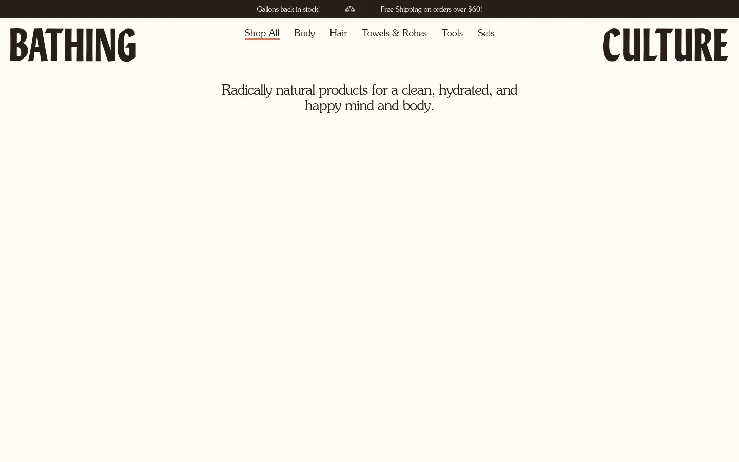 The desktop homepage features a minimalist design with a large 'BATHING CULTURE' logo split across the top corners and a centered headline reading 'Radically natural products for a clean, hydrated, and happy mind and body.' A navigation menu with links like 'Shop All', 'Body', and 'Hair' sits at the top, all set against a clean, off-white background.