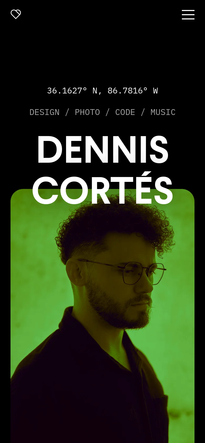 The mobile version maintains the dark theme and large white typography for the name 'DENNIS CORTÉS' over a green-tinted portrait. The desktop navigation is replaced by a hamburger menu icon in the top right and a heart icon in the top left.