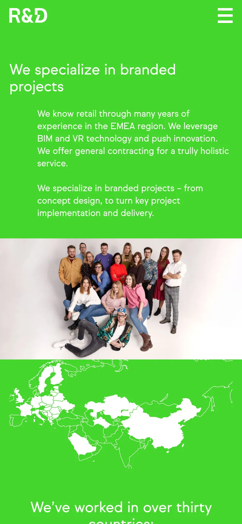 The mobile version uses a vertical layout with a large green hero section containing the headline and descriptive text. The team group photo is centered below the text, and the navigation is condensed into a hamburger menu icon in the top right corner.