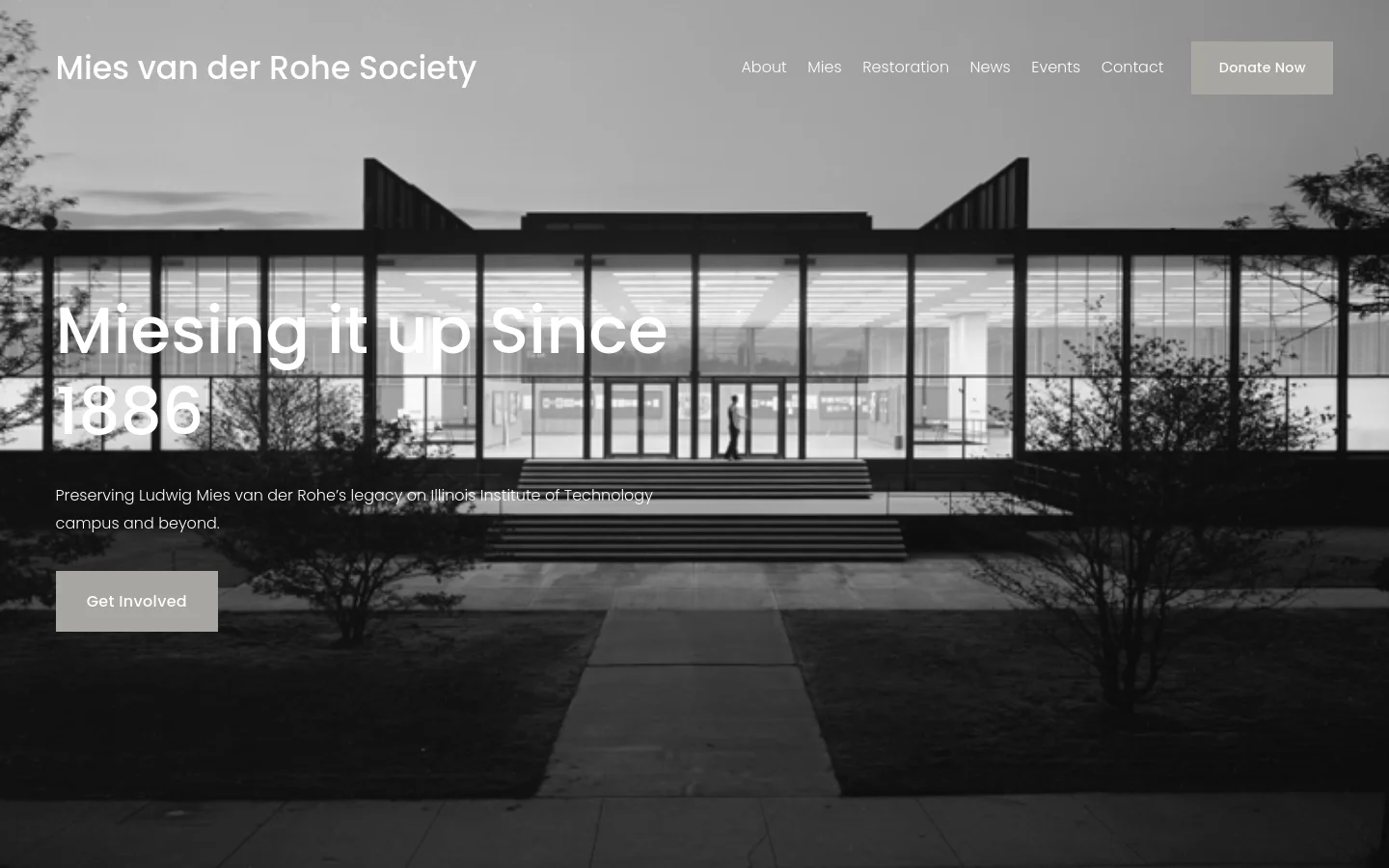The desktop homepage features a large, black-and-white hero image of a modern glass building with a central walkway. The headline 'Miesing it up Since 1886' is overlaid in large white text, followed by a brief mission statement and a 'Get Involved' call-to-action button. A navigation menu at the top includes links for About, Mies, Restoration, News, Events, and Contact, alongside a 'Donate Now' button.