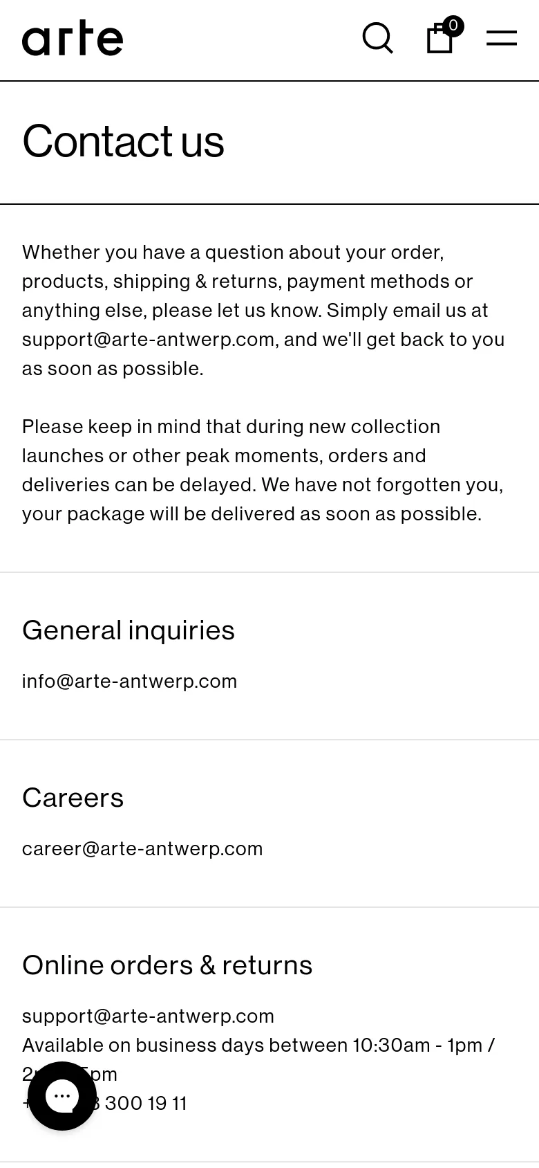 The mobile version presents a simplified, vertically stacked layout with a condensed header containing the brand logo, a search icon, a shopping bag icon, and a hamburger menu. The contact information and text are centered or left-aligned in a single column for easy scrolling, maintaining the high-contrast black and white aesthetic. A black circular floating action button is positioned in the bottom left.