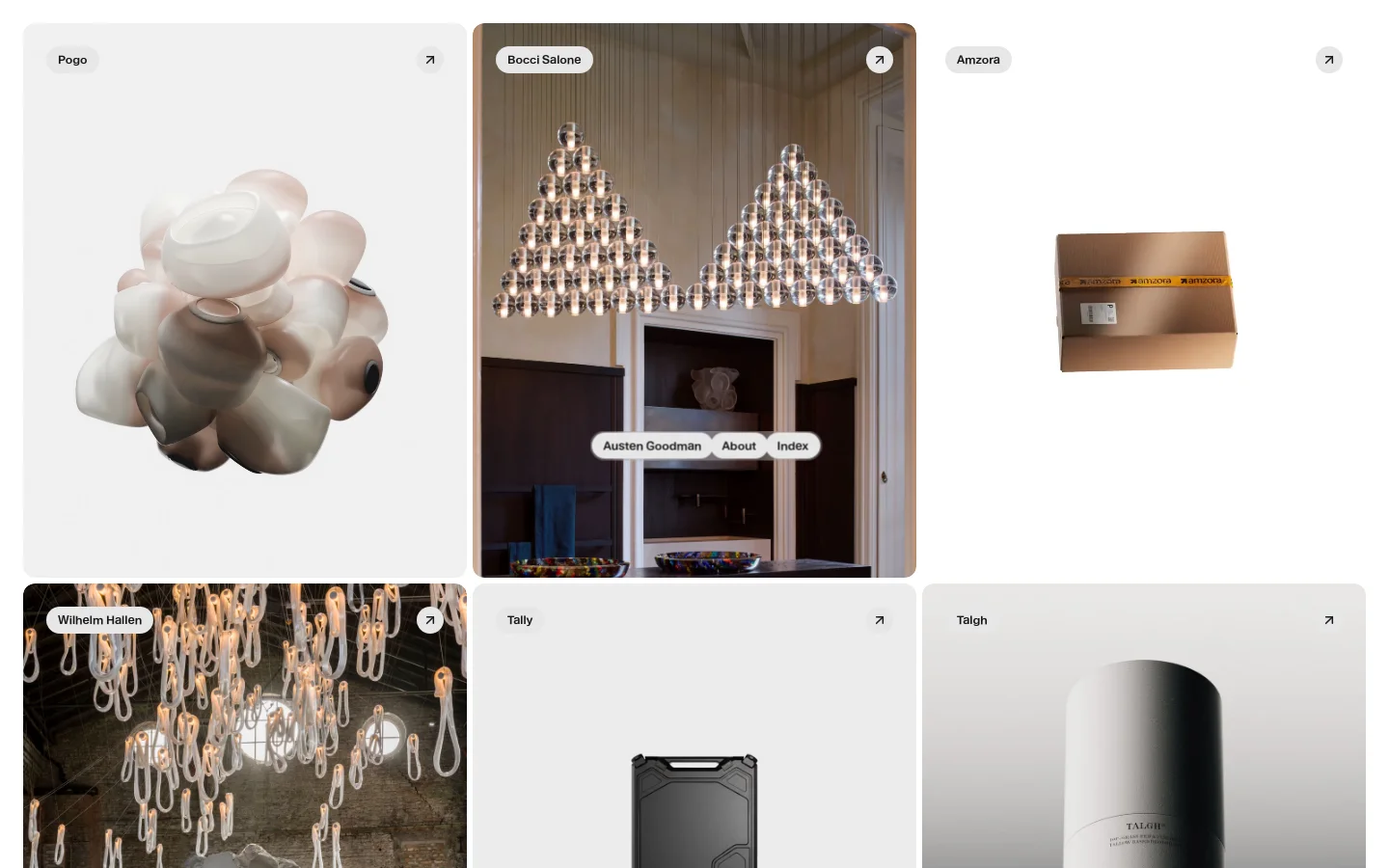 The desktop homepage features a minimalist, light-colored grid layout showcasing various design projects like Pogo and Bocci Salone. Each project entry includes a large high-quality image, a title, and a list of services provided, such as Creative Direction or Technical Design. A simple navigation menu with 'Austen Goodman', 'About', and 'Index' is centered near the middle of the screen.