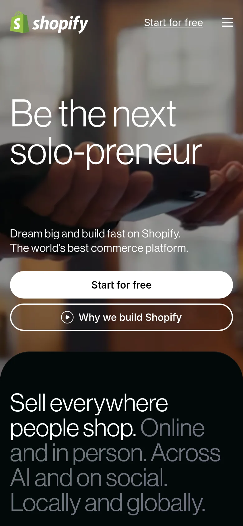 The mobile version presents a vertically stacked layout with a large hero image of a person's hands and face, featuring the headline 'Be the next solo-preneur'. Two prominent full-width buttons, 'Start for free' and 'Why we build Shopify', sit below the hero text. The header is simplified with a green Shopify logo, a 'Start for free' text link, and a hamburger menu icon.