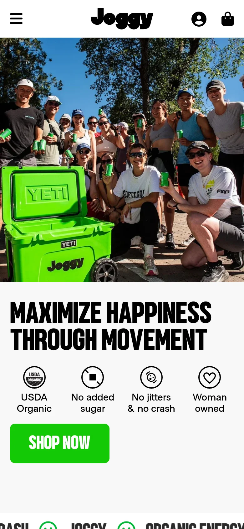 The mobile version presents a vertically stacked layout starting with the group photo at the top. Below the image, the 'MAXIMIZE HAPPINESS THROUGH MOVEMENT' headline, benefit icons, and green 'SHOP NOW' button are centered. The navigation is condensed into a hamburger menu at the top left, with the brand logo and user icons centered in the header.