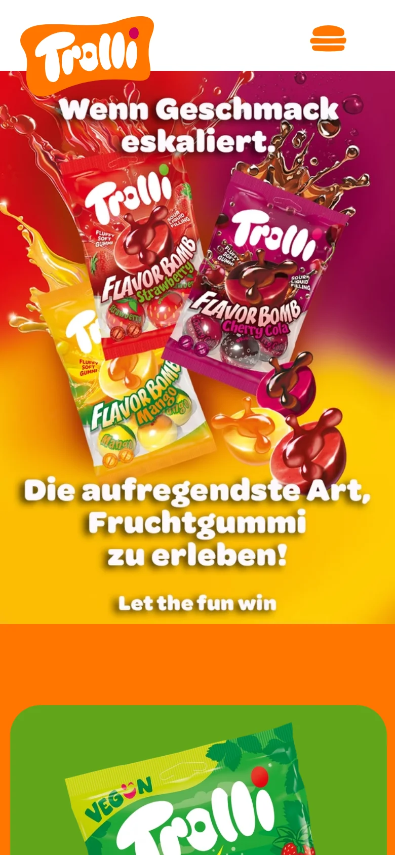 The mobile version presents a vertically stacked layout with the Trolli logo and a hamburger menu icon at the top. The hero section features the same colorful candy imagery and large white headline, but the text is centered and scaled to fit the narrower screen. The background transitions from a red top to a bright yellow bottom.