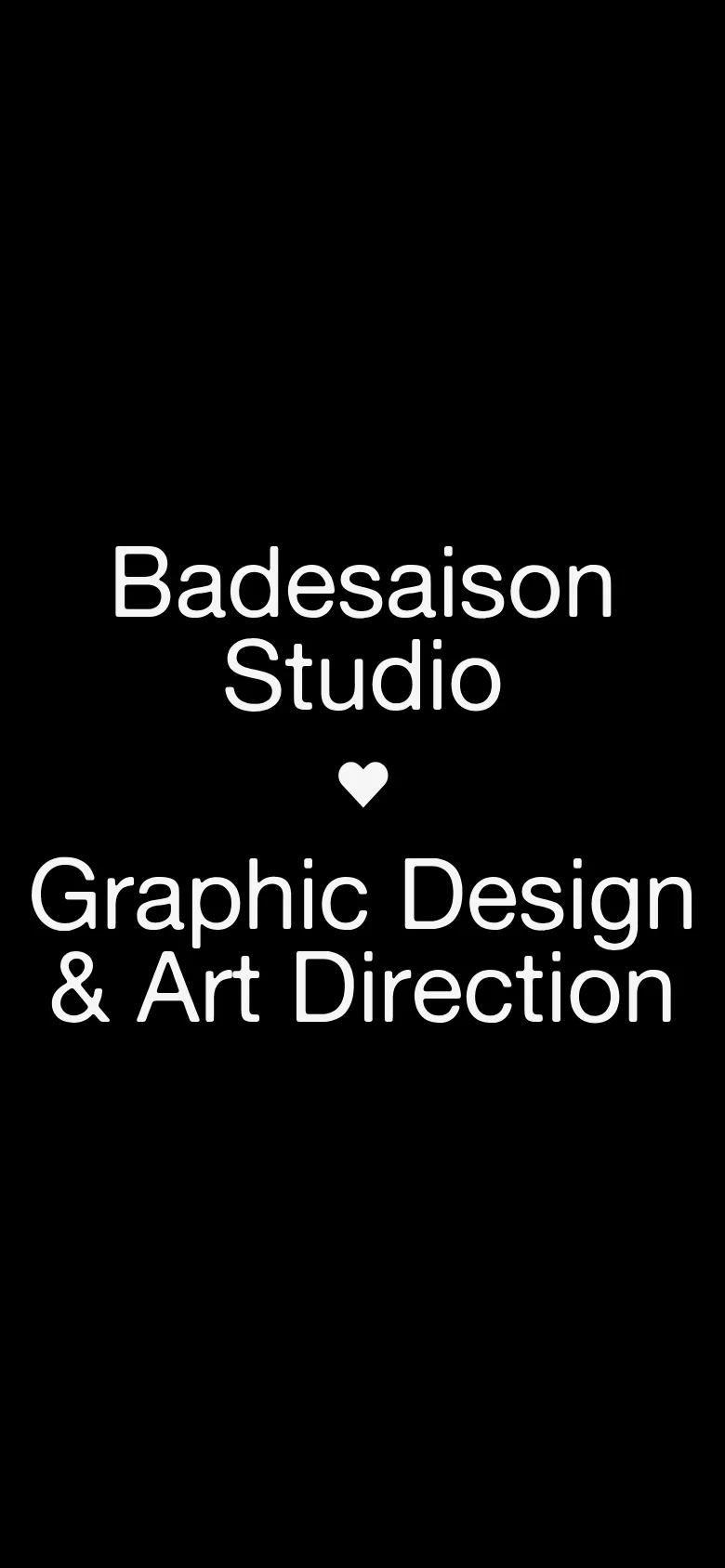 The mobile version maintains the minimalist black and white aesthetic, focusing the large centered text 'Badesaison Studio' and 'Graphic Design & Art Direction' in the middle of the screen. The layout is vertically oriented to accommodate a smaller screen, emphasizing the primary studio branding and heart icon.