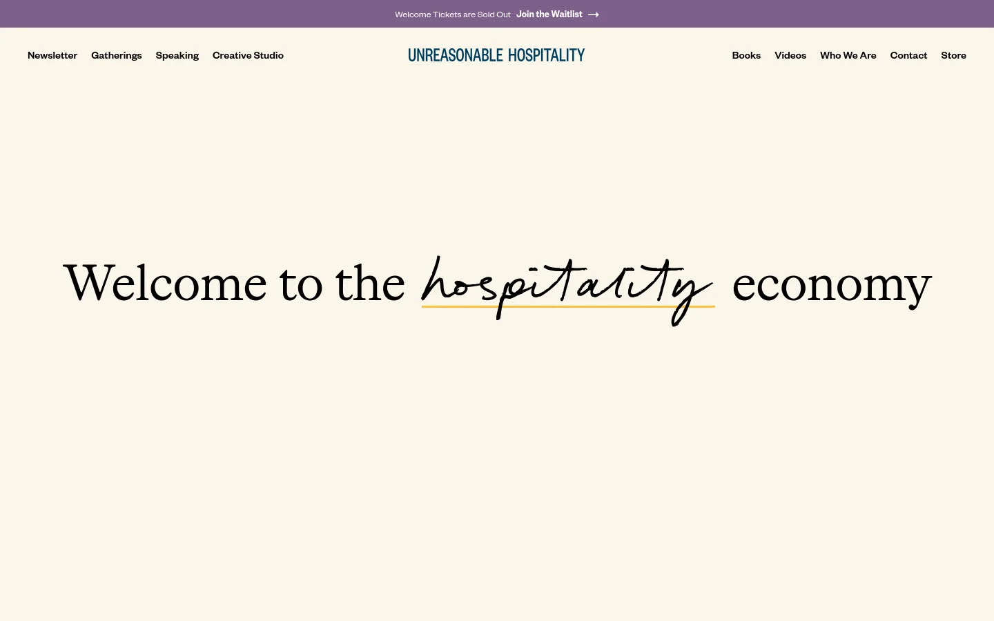 The desktop homepage features a minimalist cream background with the centered headline 'Welcome to the hospitality economy' in a mix of serif and script fonts. A top navigation bar includes links for Newsletter, Gatherings, Speaking, and Creative Studio on the left, and Books, Videos, Who We Are, Contact, and Store on the right, with the brand logo centered. A purple announcement bar at the very top invites users to join a waitlist.