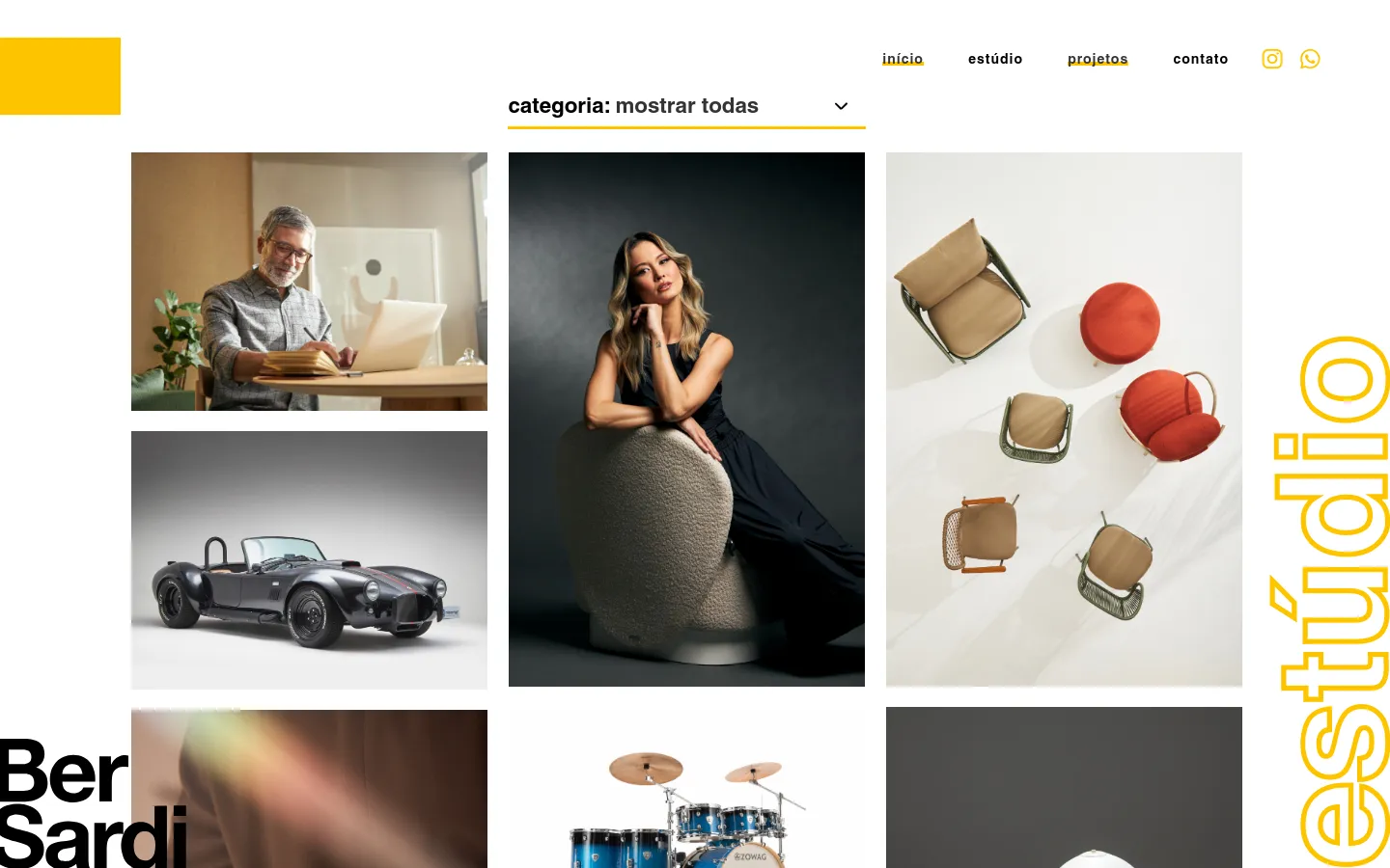 The desktop portfolio page features a clean white background with a navigation menu at the top and a category dropdown menu. A grid of large, high-quality project images is displayed, including a man working on a laptop, a portrait of a woman, and various product shots. A large, vertical yellow 'estúdio' text element is positioned on the right side of the screen.