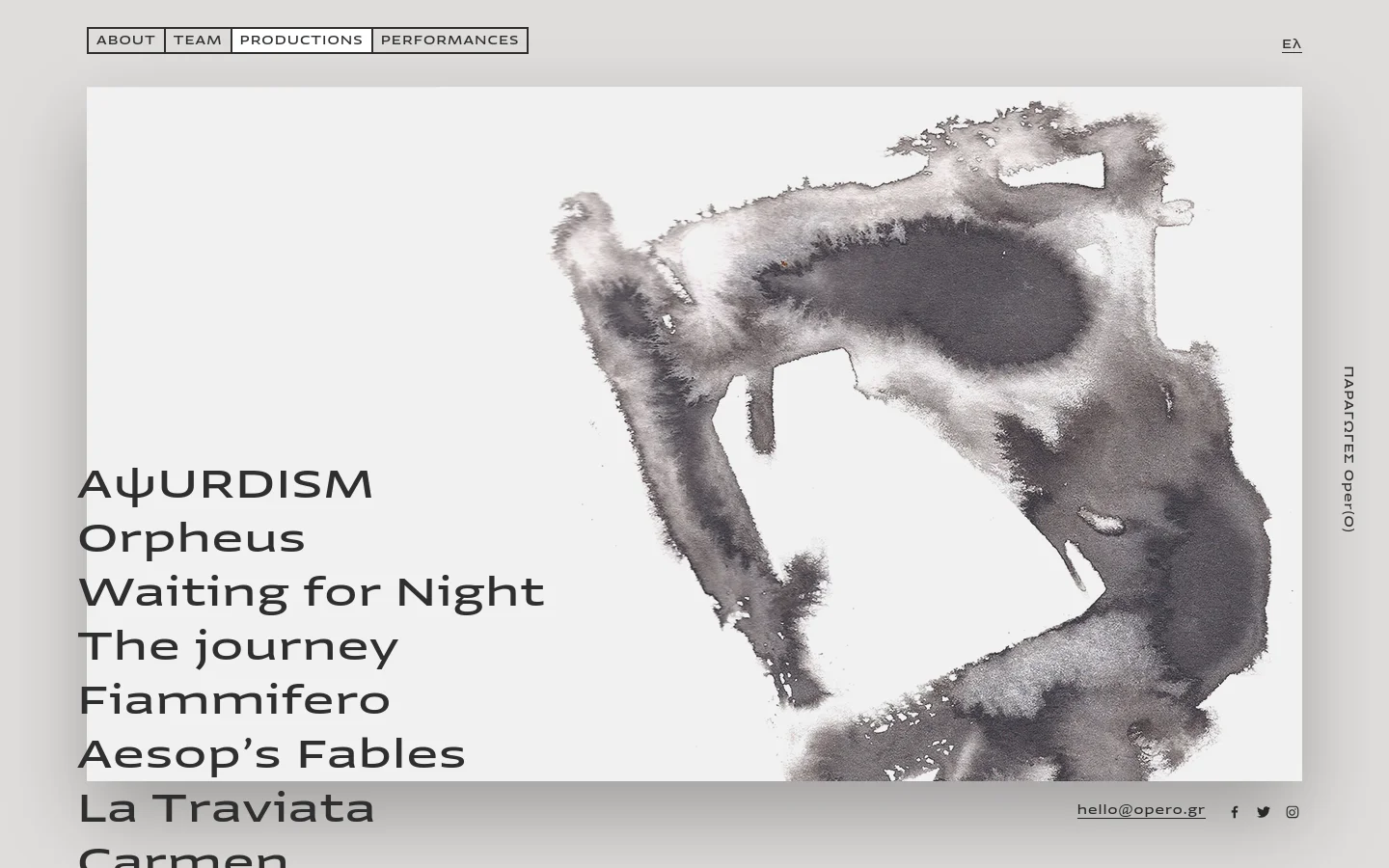 The desktop page features a minimalist design with a light gray background and a large, abstract black and white watercolor wash on the right. On the left, a vertical list of production titles like 'AψURDISM' and 'Orpheus' serves as navigation, set against the large artwork. A top navigation bar includes links for About, Team, Productions, and Performances, while social media icons and an email address are located at the bottom.