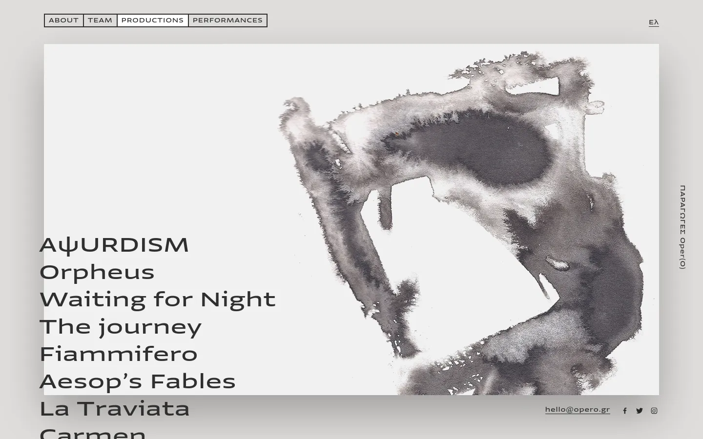 The desktop page features a minimalist design with a light gray background and a large, abstract black and white watercolor wash on the right. On the left, a vertical list of production titles like 'AψURDISM' and 'Orpheus' serves as navigation, set against the large artwork. A top navigation bar includes links for About, Team, Productions, and Performances, while social media icons and an email address are located at the bottom.