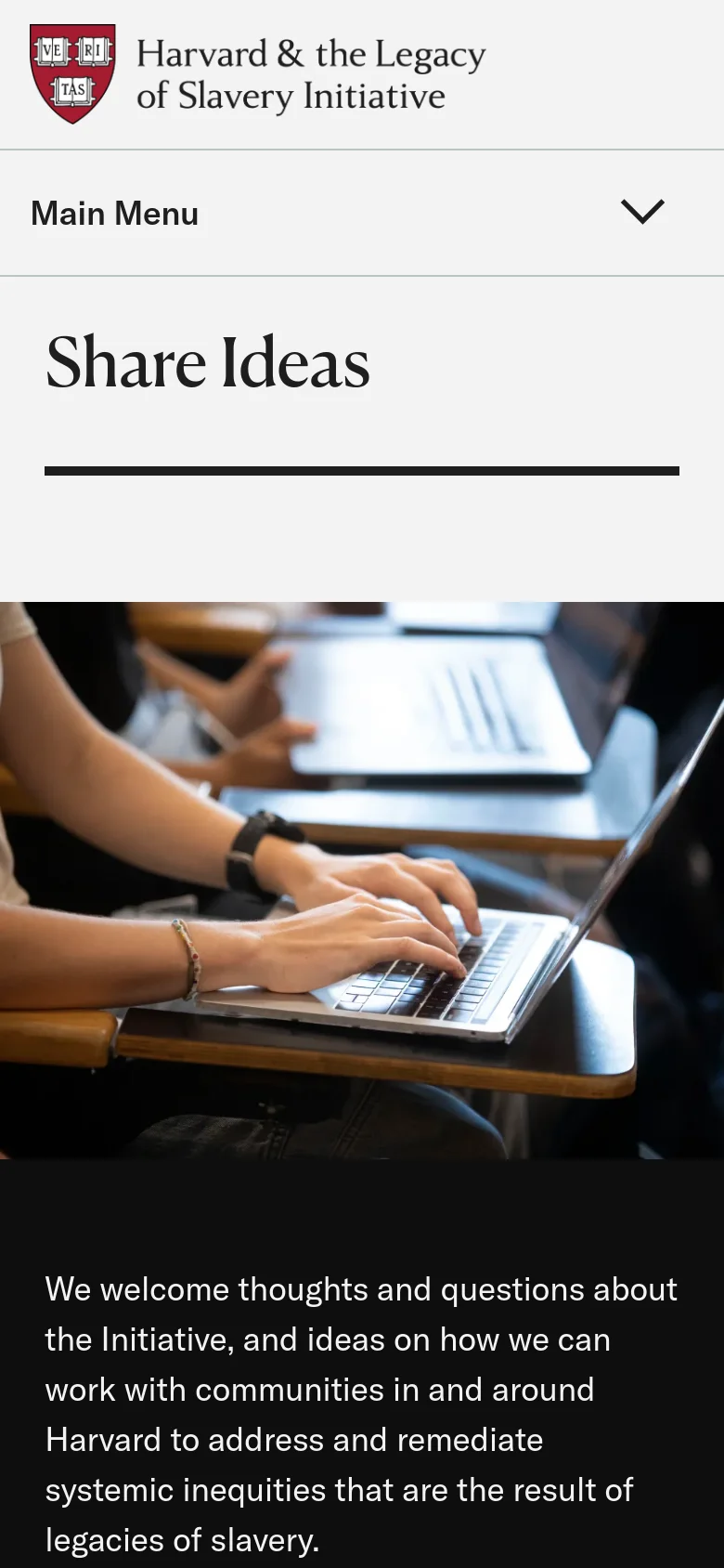 The mobile version uses a simplified layout with a 'Main Menu' accordion dropdown at the top. The 'Share Ideas' heading and hero image are stacked vertically, with the text content appearing below the large image of hands using a laptop.