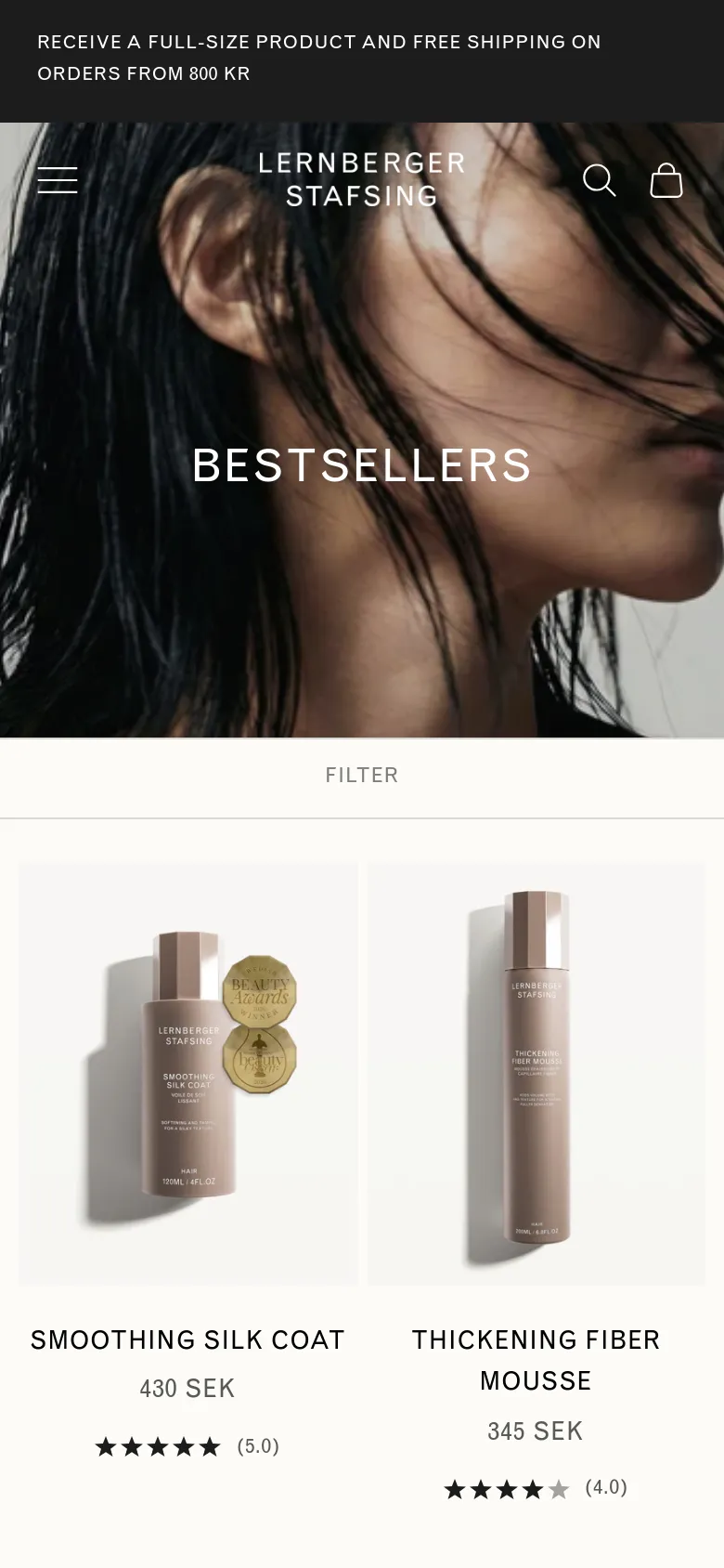 The mobile version presents a condensed layout with a large hero image of wet hair and the 'BESTSELLERS' title. The navigation is simplified into a hamburger menu, and the product grid shifts to a single or double column view, showing product images, names, prices, and ratings prominently below a 'FILTER' button.