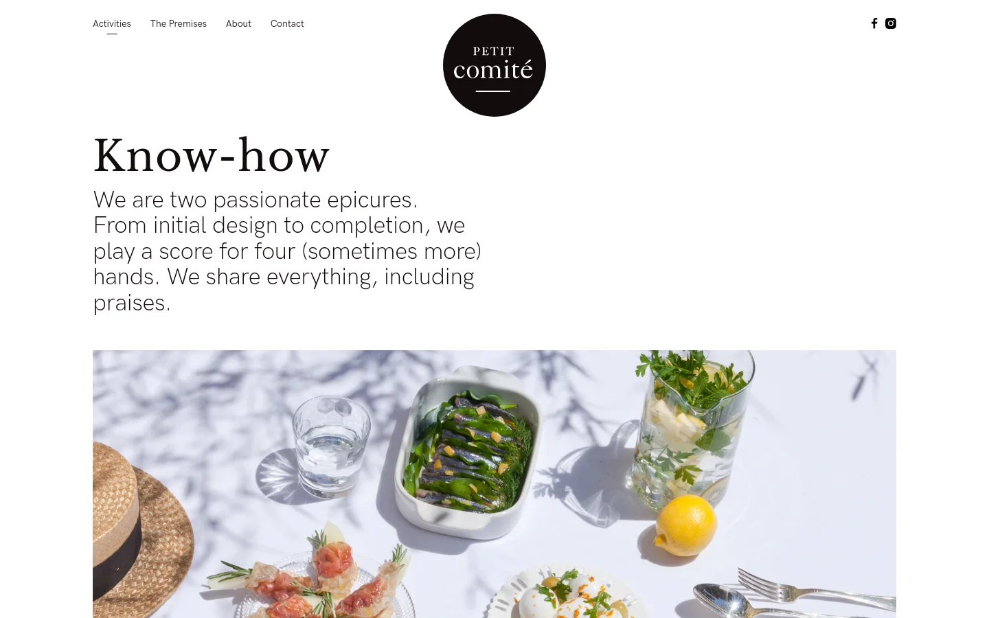 The desktop page features a minimalist design with a white background and black serif typography. A navigation menu sits at the top, centered by a circular black logo for 'Petit Comité'. Below the headline 'Know-how' and an introductory paragraph, a large hero image shows a bright, sunlit table setting with various culinary dishes, glassware, and a lemon.
