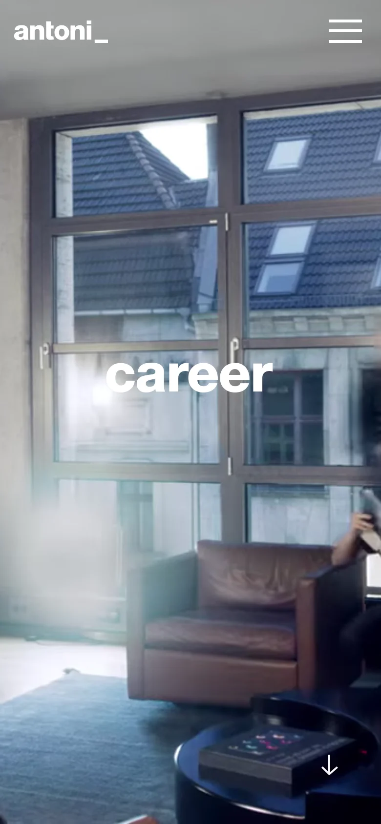 The mobile version shows a vertically cropped version of the office hero image, focusing on the window view and a leather armchair. The word 'career' remains centered in large white text, and the navigation menu is replaced by a white hamburger icon in the top right corner.
