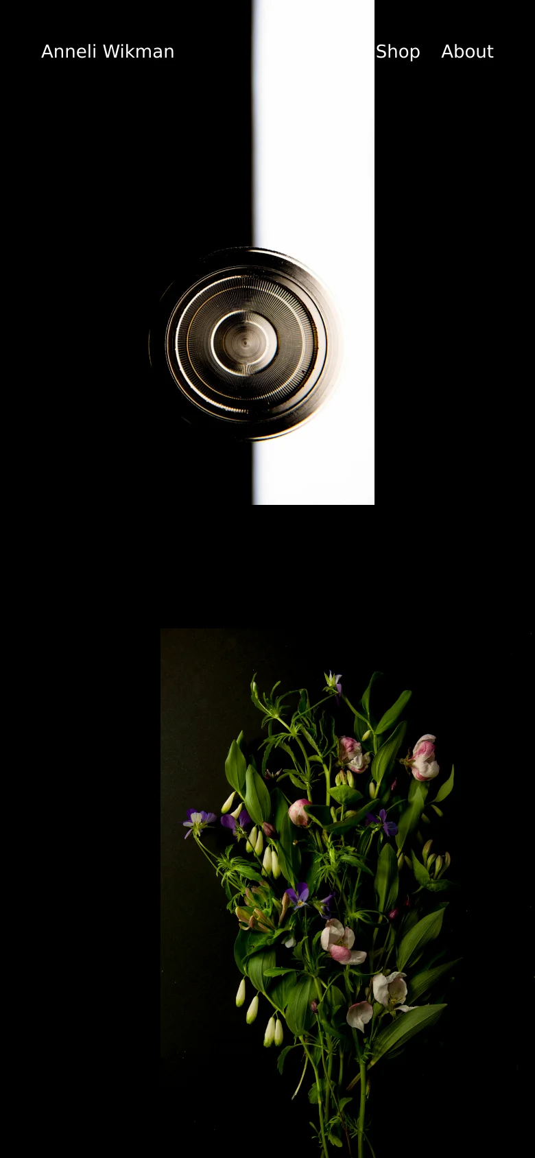 The mobile version maintains the dark aesthetic and minimalist navigation but uses a vertical layout. The hero imagery is stacked, showing a high-contrast close-up of a metallic object followed by a lush bouquet of green and pink flowers, optimized for a narrow screen.