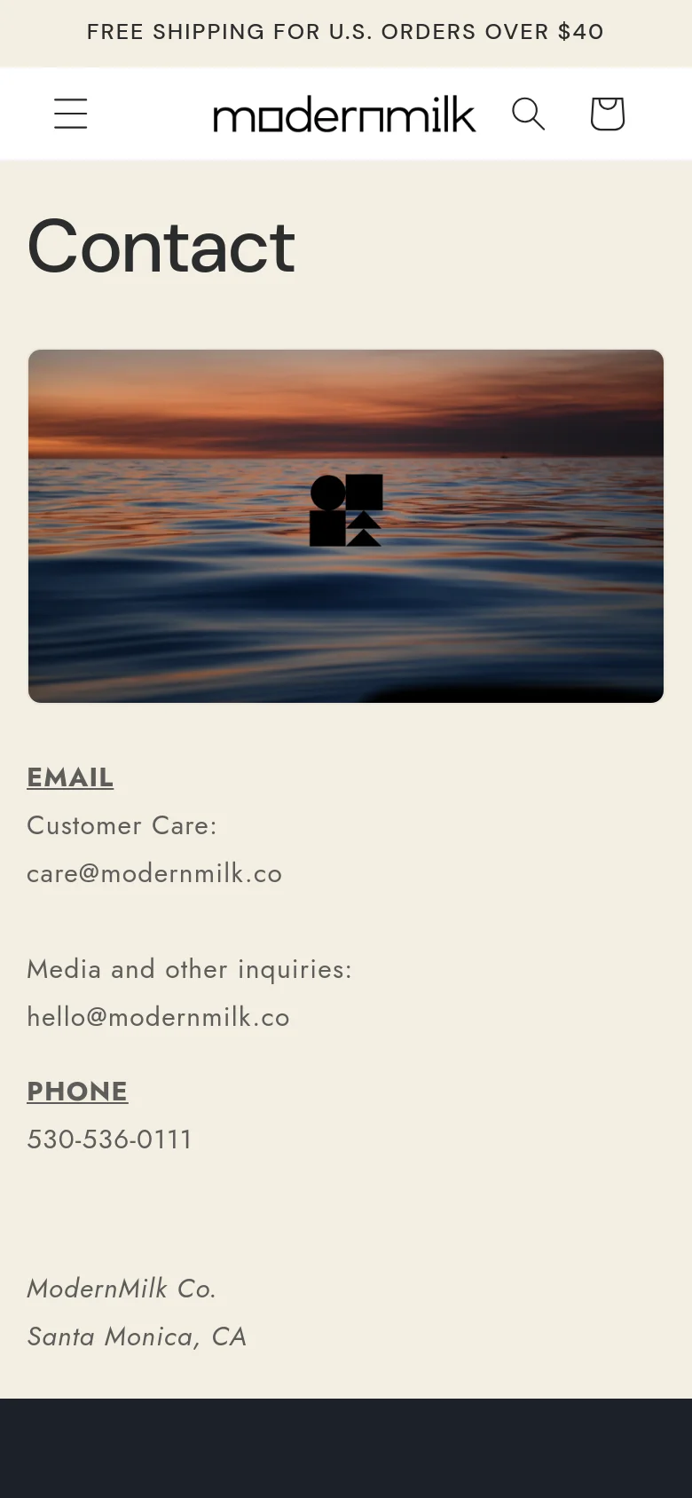 The mobile version presents a simplified, single-column layout with the 'Contact' headline and sunset ocean hero image at the top. The contact details, including email and phone number, are stacked vertically below the image for easy scrolling. The header is condensed, showing the logo, a hamburger menu icon, a search icon, and a shopping bag icon.