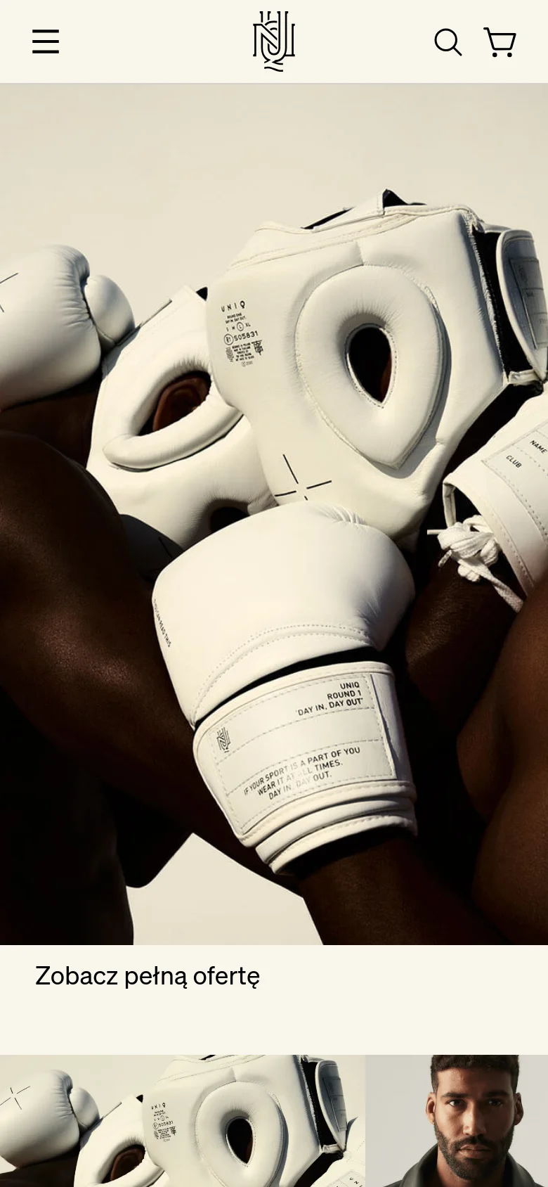 The mobile version presents a condensed header with a hamburger menu icon on the left, the central UNIQ logo, and search and cart icons on the right. The hero section features a close-up high-contrast image of white boxing gloves and protective gear, with a large 'Zobacz pełną ofertę' call to action at the bottom.