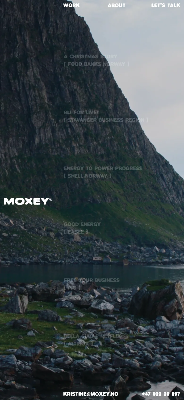 The mobile version presents a vertically oriented view of the same coastal landscape background. The layout is simplified with the Moxey logo and navigation links stacked at the top, and the contact information prominently displayed at the bottom of the screen.