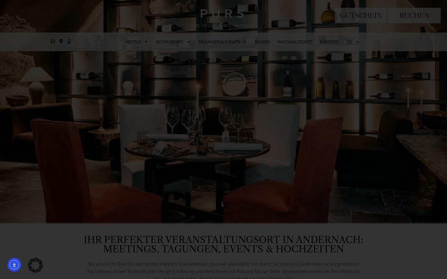 The desktop page features a large hero image of an elegantly set dining table with wine glasses and candles in a dimly lit, sophisticated restaurant setting. A transparent navigation bar sits atop the image with links for Hotels, Restaurants, and Tagungen & Events, alongside 'Gutschein' and 'Buchen' buttons. Below the hero, a clean white section contains the main headline 'Ihr perfekter Veranstaltungsort in Andernach' in dark serif typography.