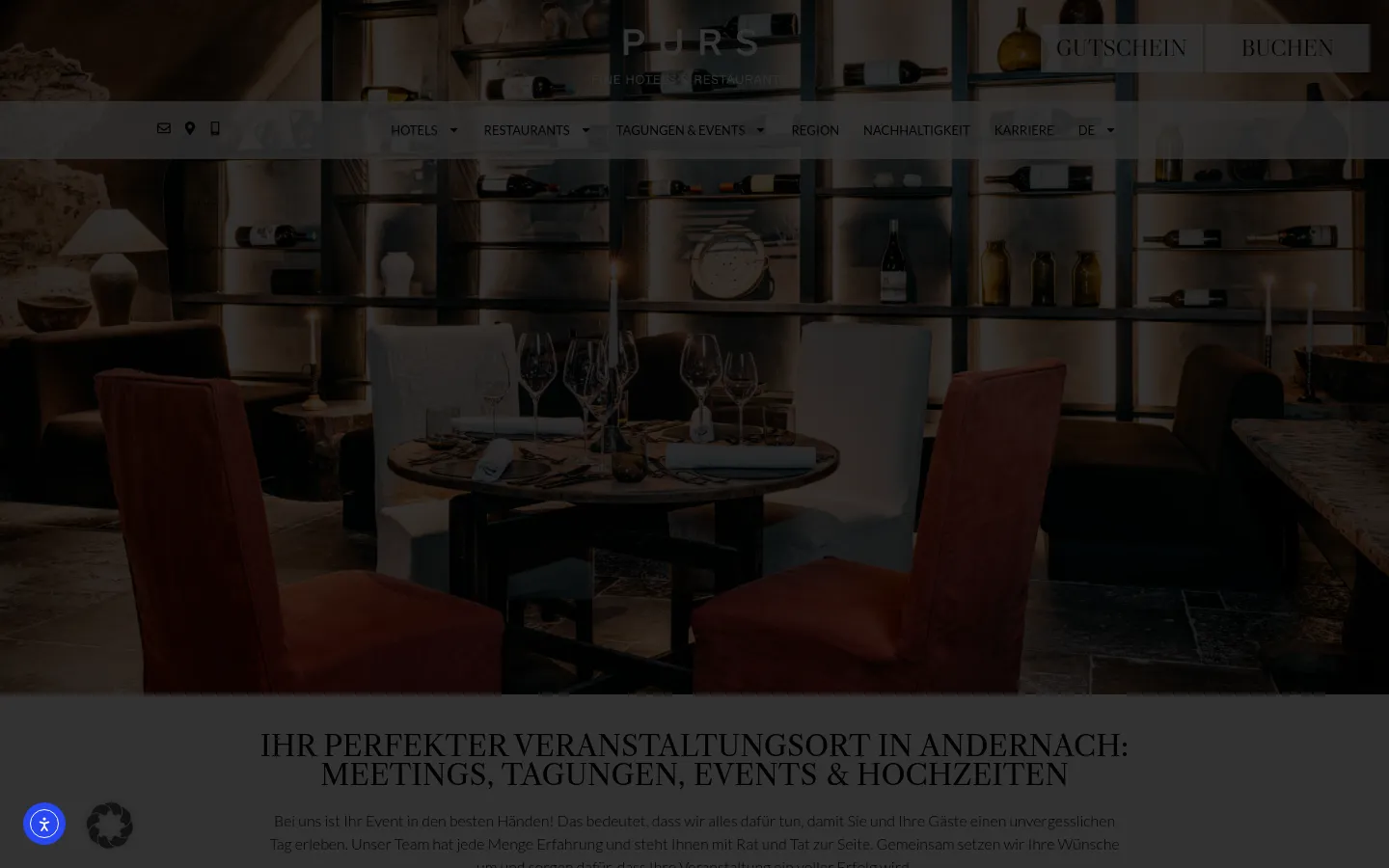 The desktop page features a large hero image of an elegantly set dining table with wine glasses and candles in a dimly lit, sophisticated restaurant setting. A transparent navigation bar sits atop the image with links for Hotels, Restaurants, and Tagungen & Events, alongside 'Gutschein' and 'Buchen' buttons. Below the hero, a clean white section contains the main headline 'Ihr perfekter Veranstaltungsort in Andernach' in dark serif typography.