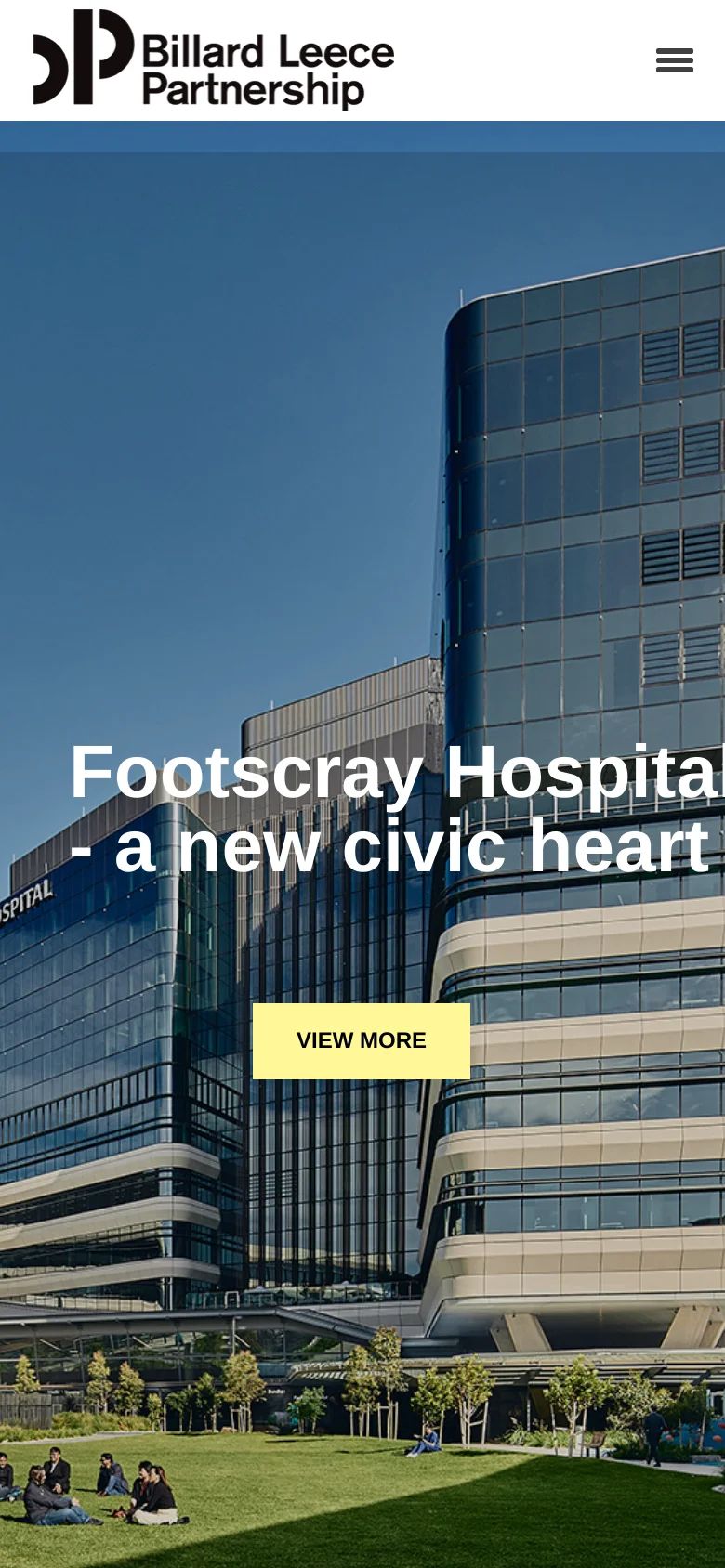 The mobile version presents a vertically stacked layout, starting with the company logo and a hamburger menu icon at the top. The hero section features a large image of a modern building with the prominent white headline 'Footscray Hospital - a new civic heart' and a pale yellow 'VIEW MORE' call-to-action button. The design transitions from the wide horizontal view of desktop to a single-column focus on the imagery and primary text.