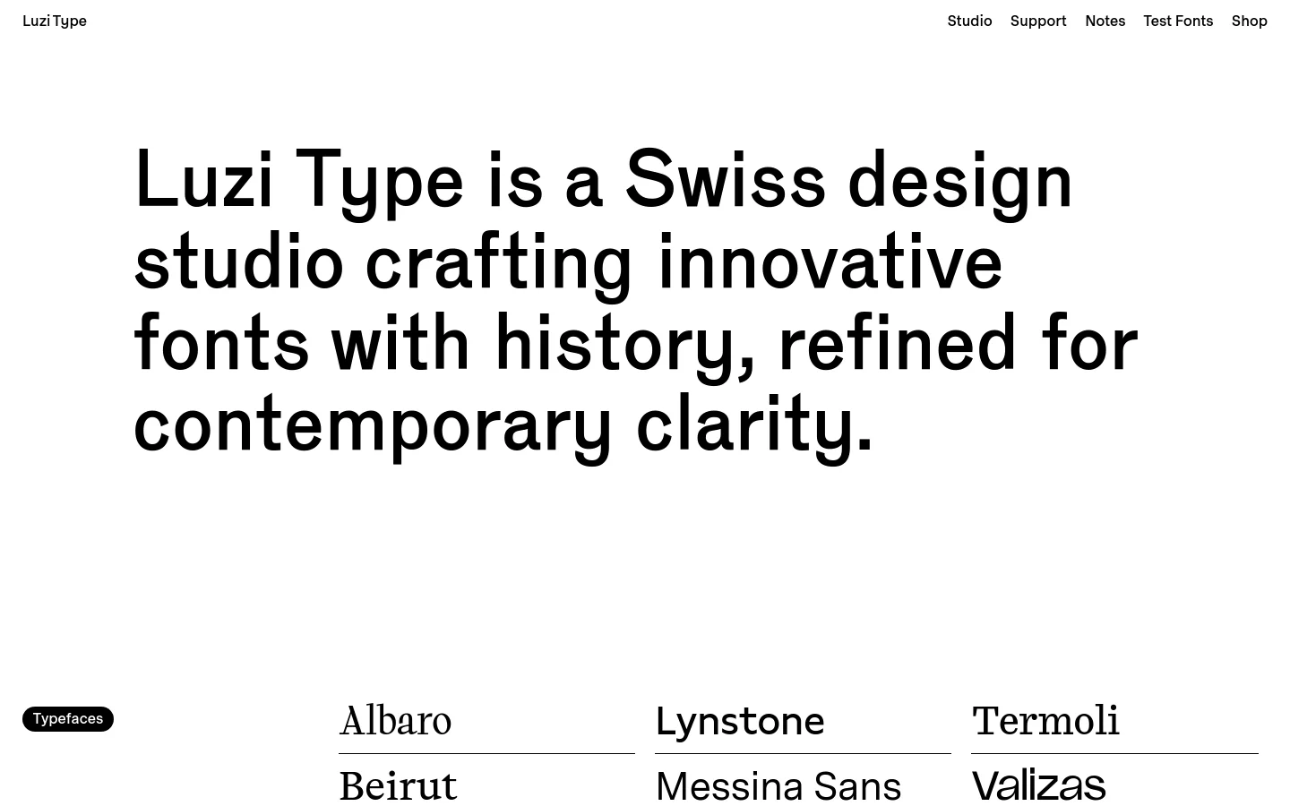 The desktop homepage for Luzi Type features a minimalist white background with black text. A large, bold headline dominates the center, stating 'Luzi Type is a Swiss design studio crafting innovative fonts with history, refined for contemporary clarity.' A navigation menu is at the top right, and a 'Typefaces' section below displays a grid of font names like Albaro and Beirut.