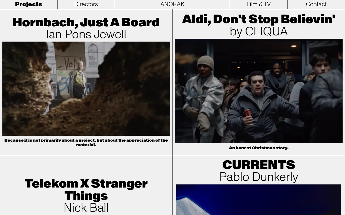 The Projects page features a minimalist grid layout with large, bold black typography on a light grey background. Each project entry includes a prominent headline, director name, a cinematic still image, and a brief descriptive sentence. The desktop view displays projects in a multi-column grid format.