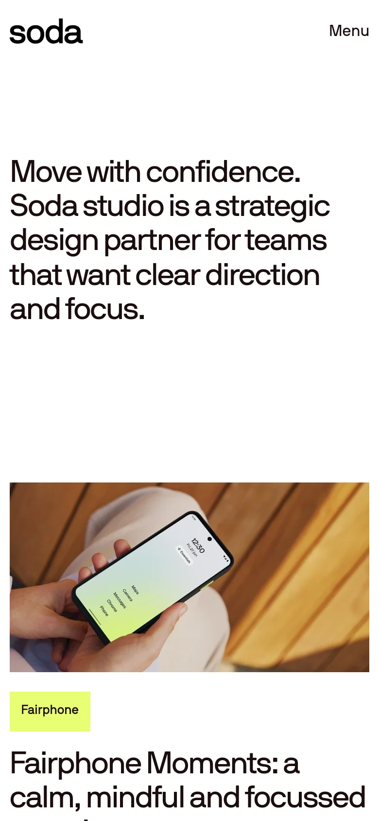 The mobile version uses a simplified layout with a single 'Menu' text link in the top right instead of a full navigation bar. The hero headline is stacked vertically, and the large project image for Fairphone is displayed prominently with a lime green 'Fairphone' label above the project title.
