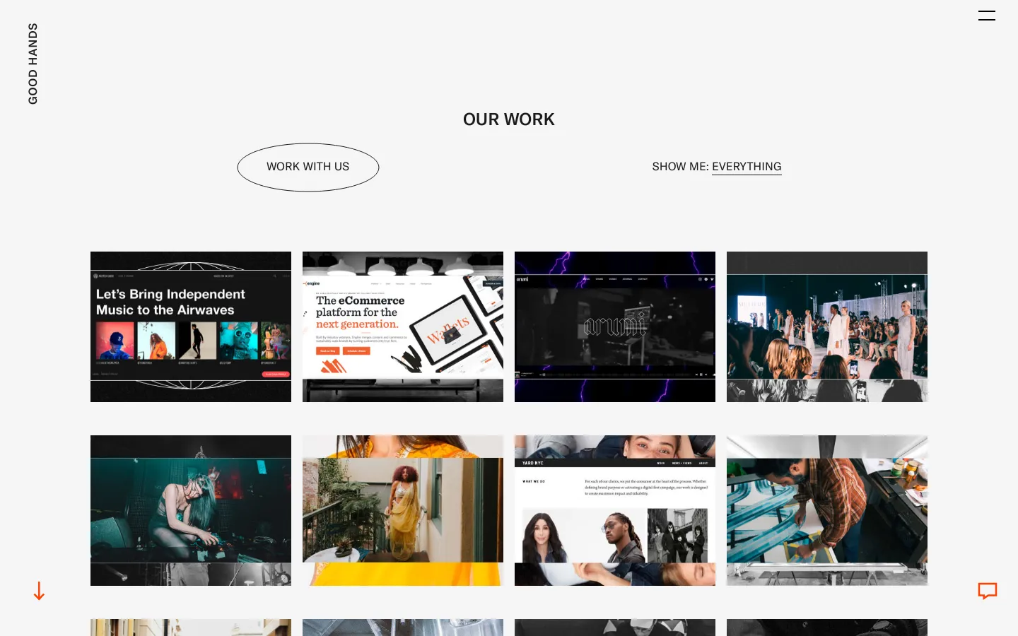 The 'Our Work' page features a minimalist white background with a large 'OUR WORK' headline and a 'WORK WITH US' call-to-action button. A grid of large, rectangular project tiles displays various colorful case studies, including music and e-commerce branding. The layout is spacious with a vertical 'GOOD HANDS' logo on the left margin.